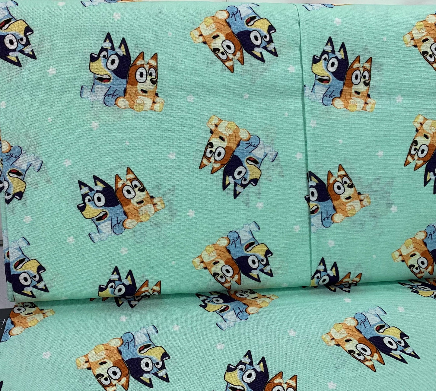 Bingo and Bluey fabric CP80835 Disney cotton fabric Best Friends Green - Mary Jo Fabrics