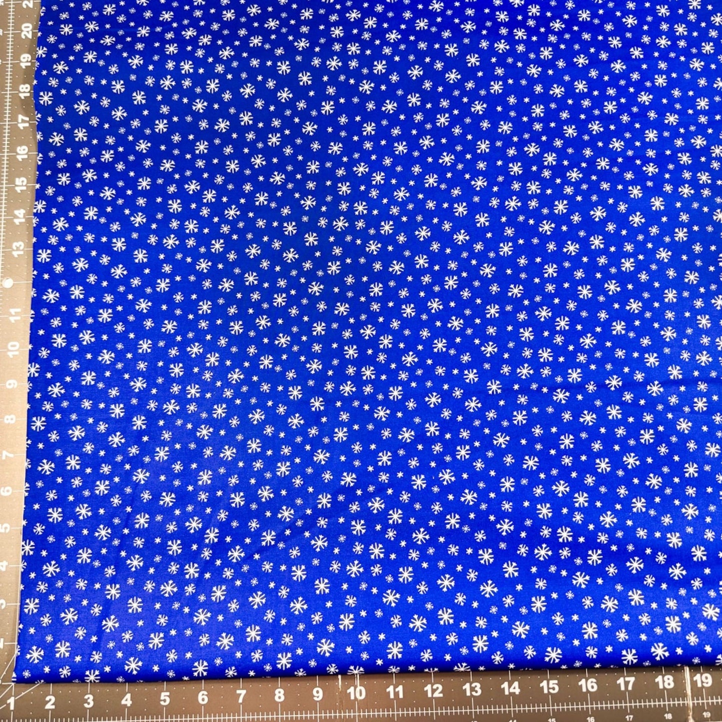 Frosty Flakes White Snowflake fabric Royal Blue Cotton - Mary Jo Fabrics