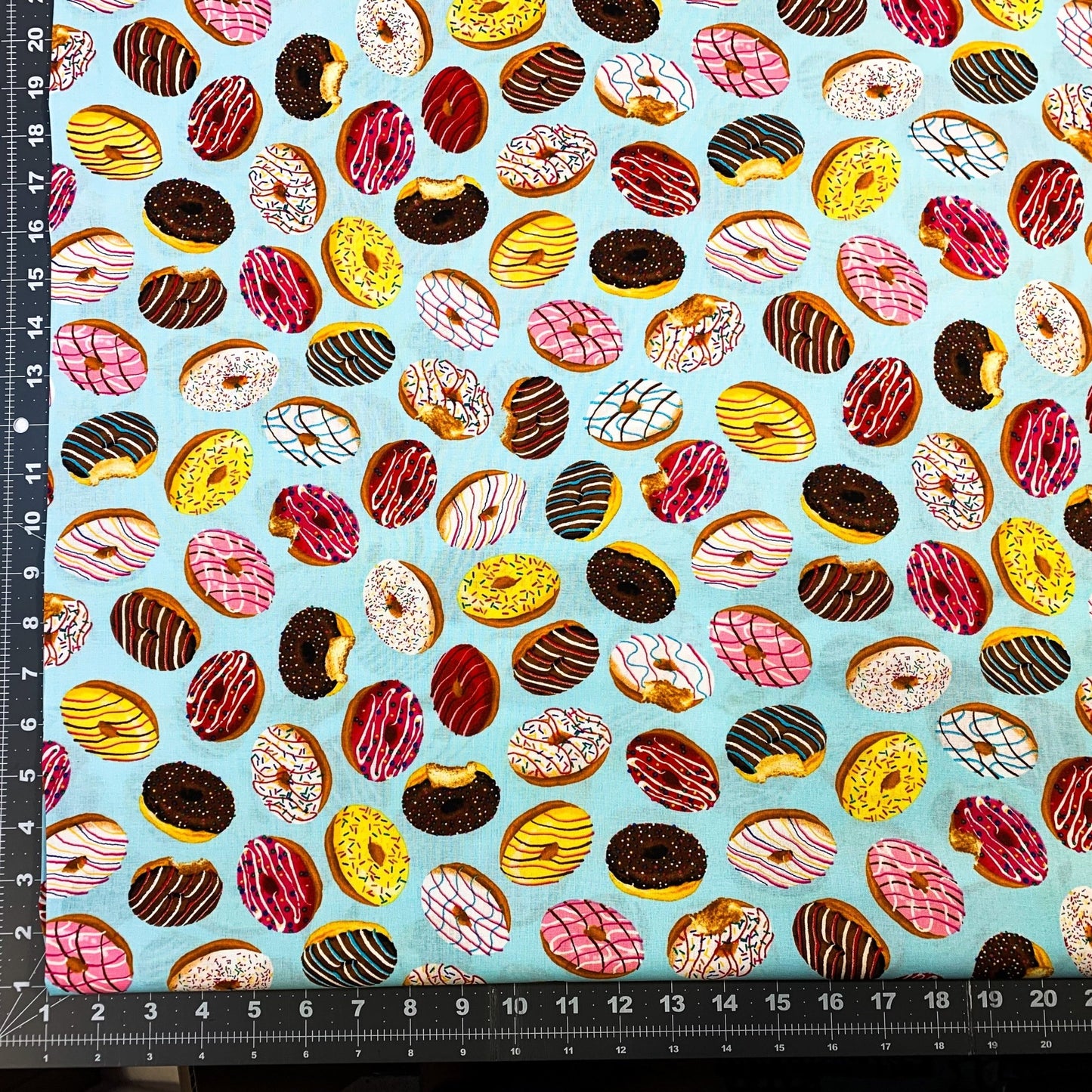 Lt Blue Tossed Donut fabric 15567324 Iced Donuts - Mary Jo Fabrics