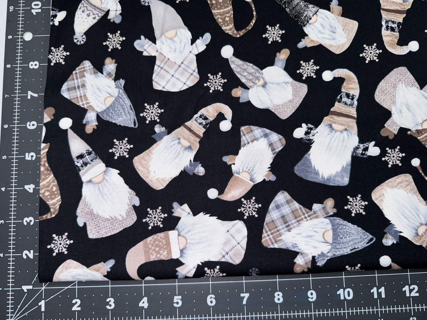 Tossed White Holiday Gnomes fabric C8207