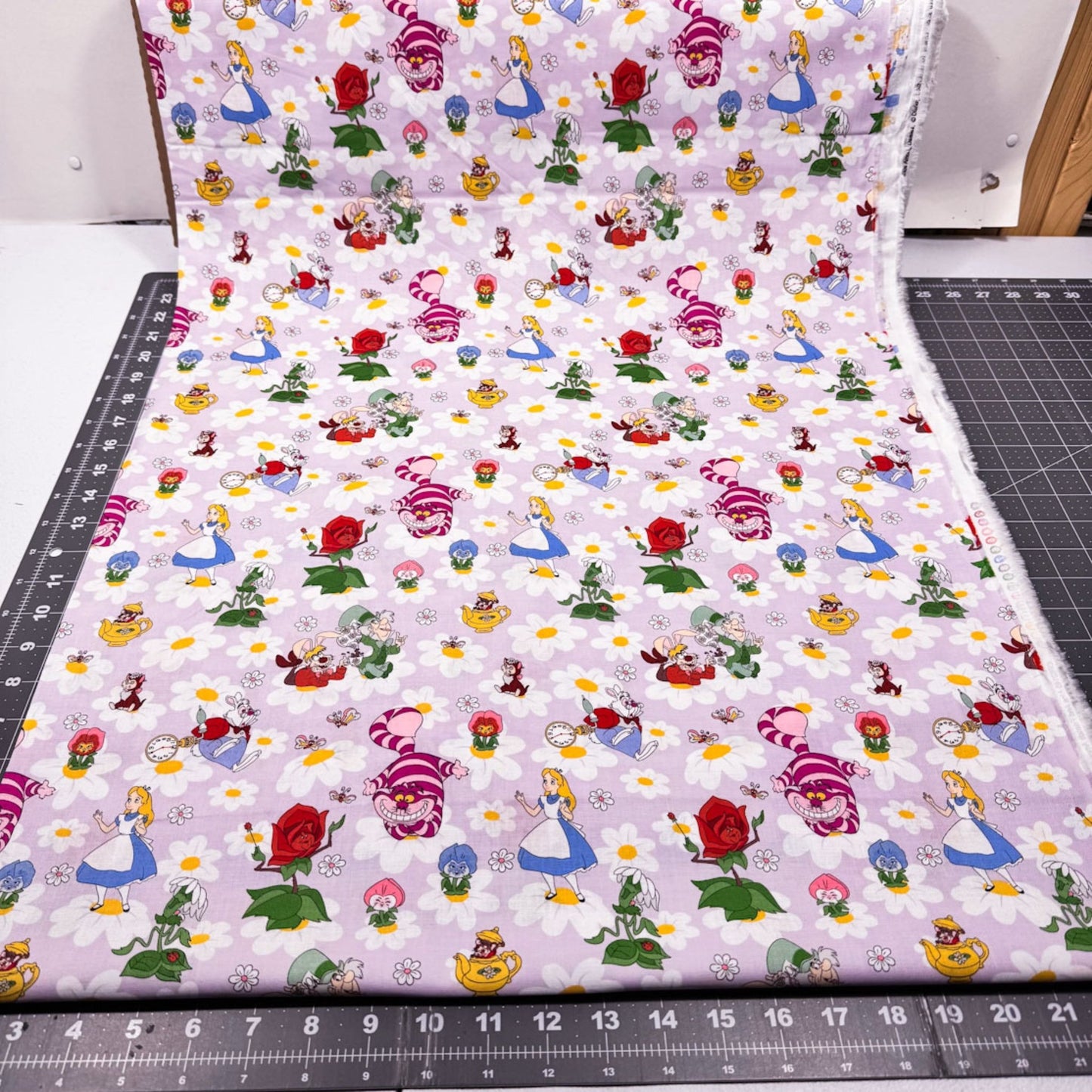 Alice in Wonderland Fabric 80145 Alice Mad Hatter Cheshire Cat - Mary Jo Fabrics