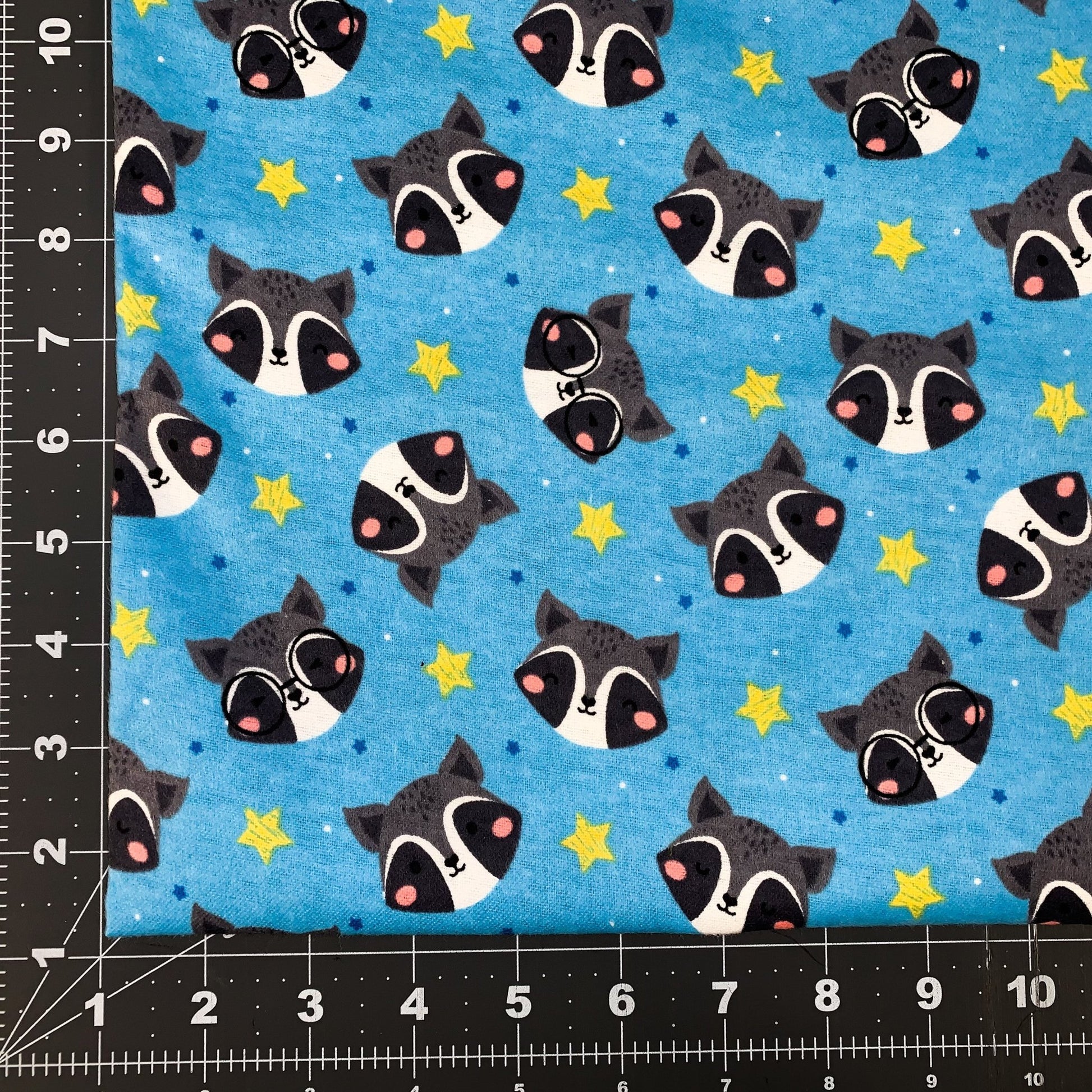 Blue Raccoon FLANNEL fabric DX - 4835 - 4F1 Blue Racoon - Mary Jo Fabrics
