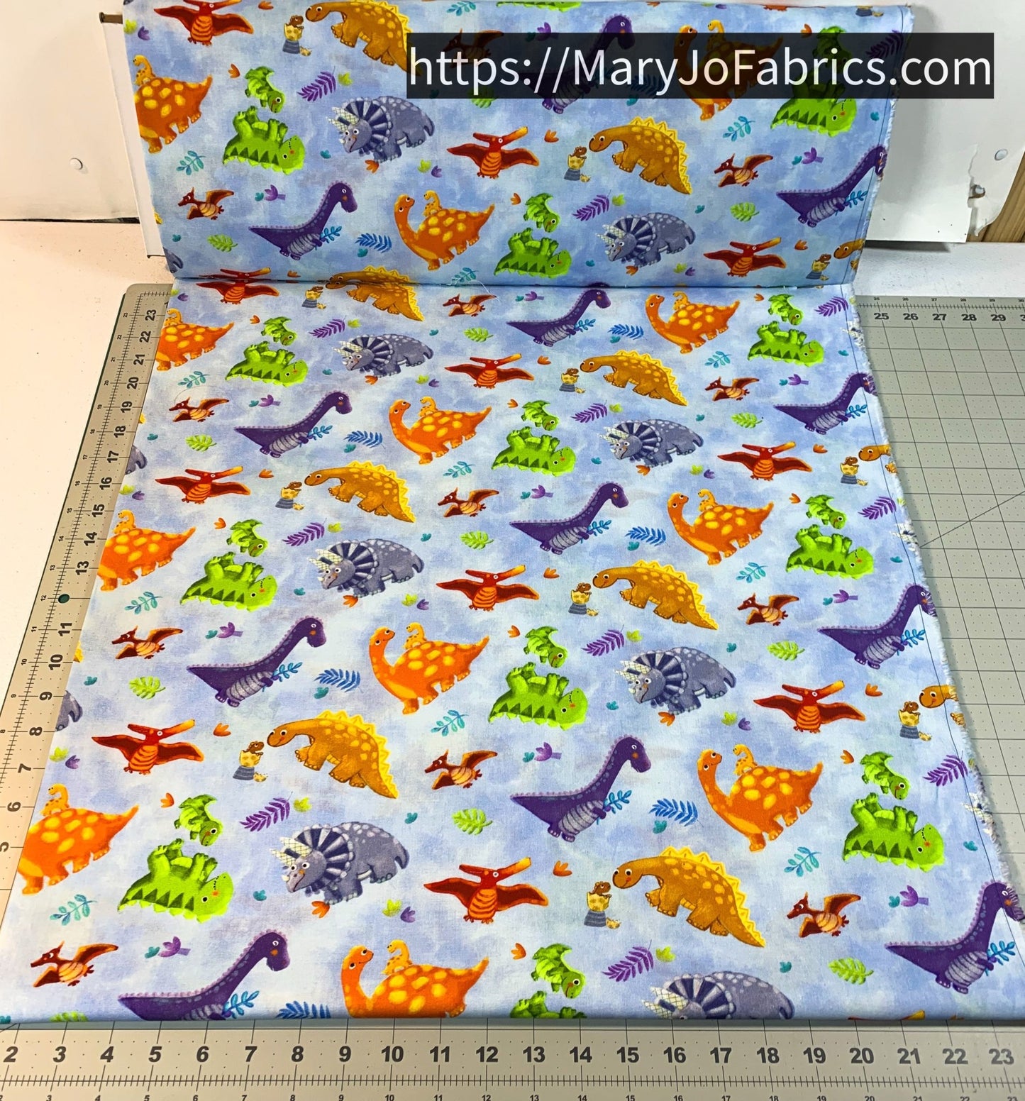 Blue Tossed Baby Dinosaur Fabric 59 - 8541 Dino Wee Ones - Mary Jo Fabrics