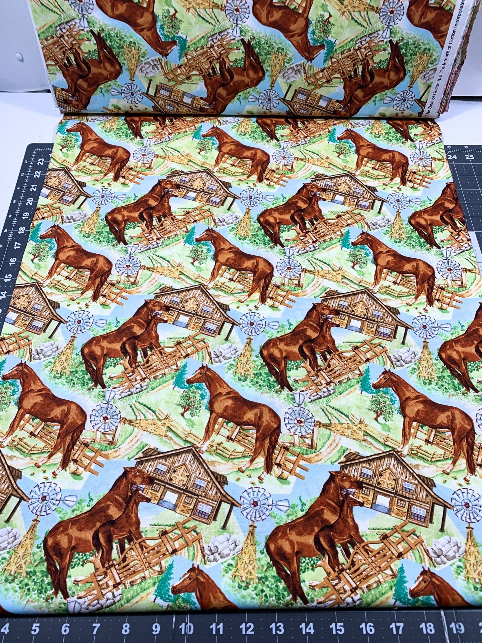 Horse landscape fabric with barn and fence Mary Jo Fabrics