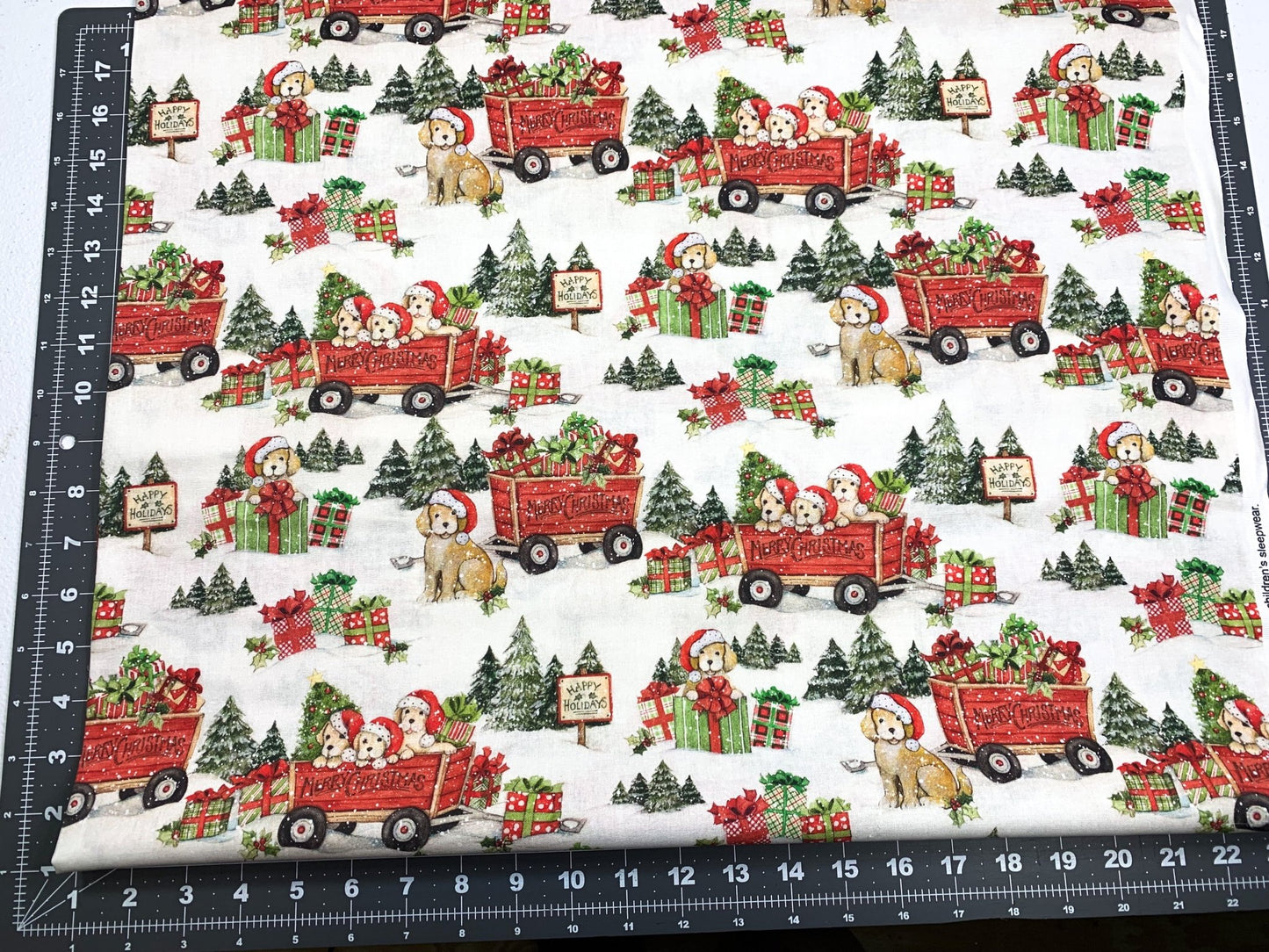 Christmas puppies fabric Santa hat wearing pups - Mary Jo Fabrics