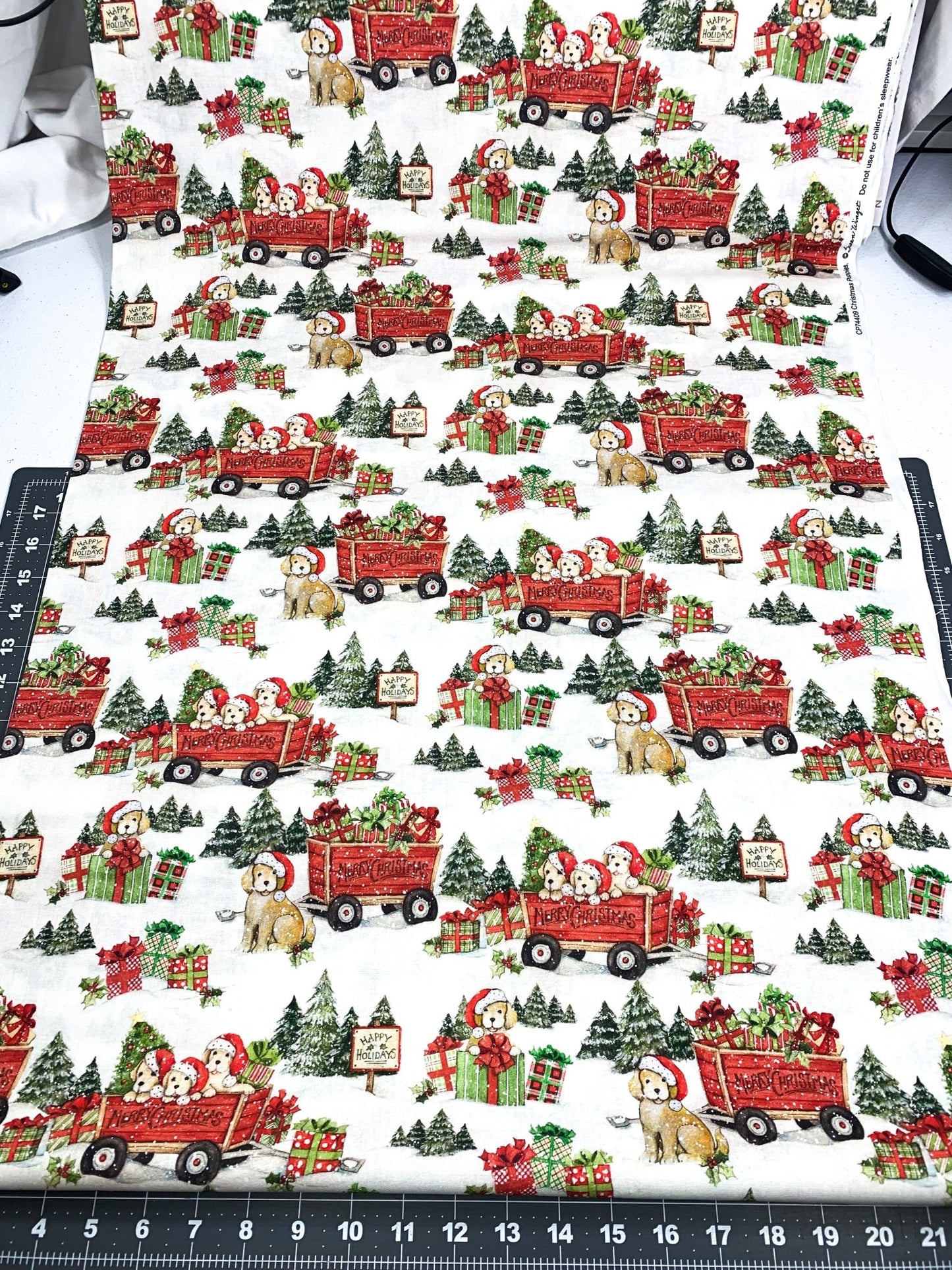 Christmas puppies fabric Santa hat wearing pups - Mary Jo Fabrics