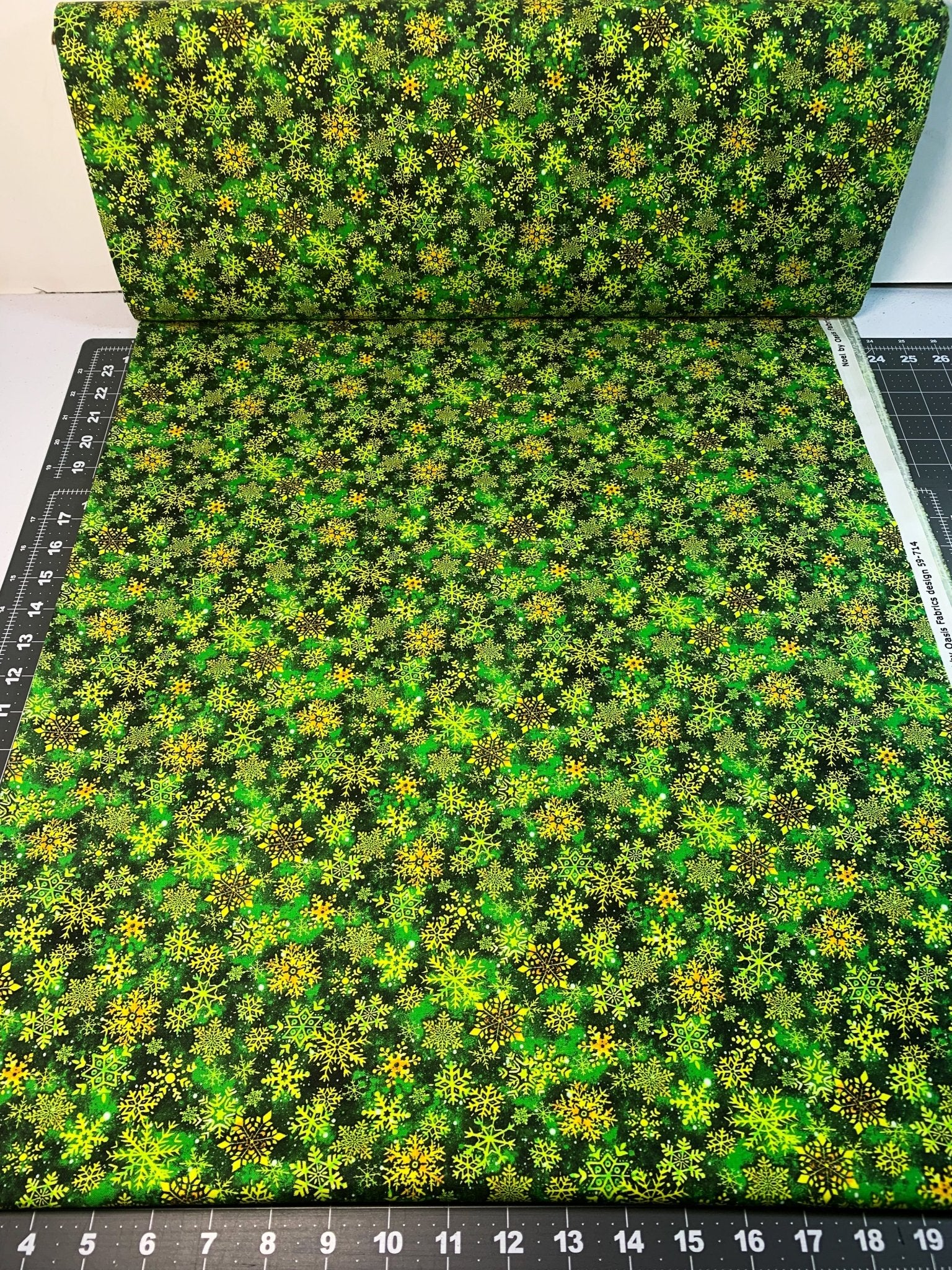 Christmas Snowflake fabric 59-7141 Gold & Green Snowflakes - Mary Jo Fabrics