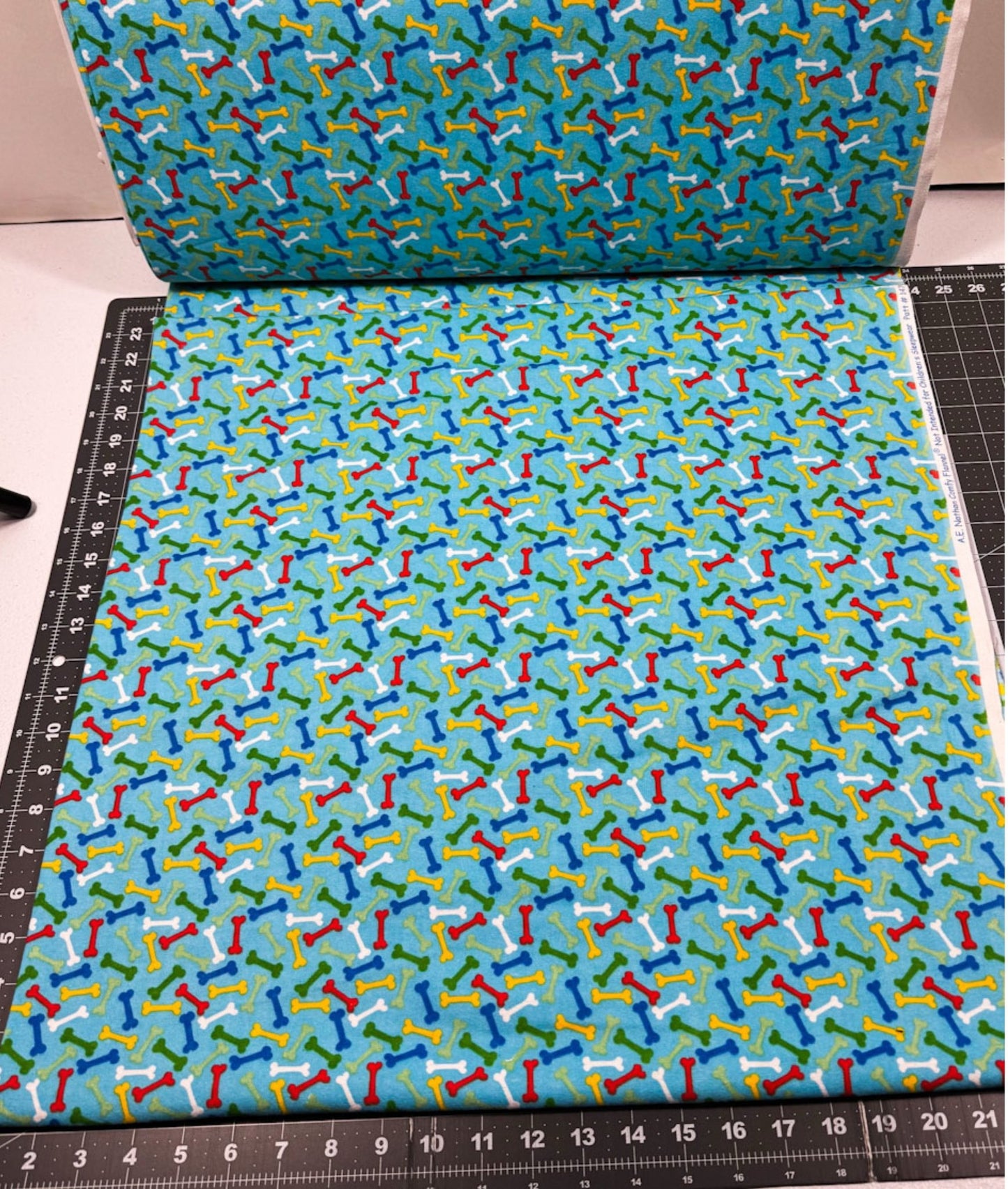 Colorful Dog Bones FLANNEL 14706 Blue Dog Cotton Flannel - Mary Jo Fabrics