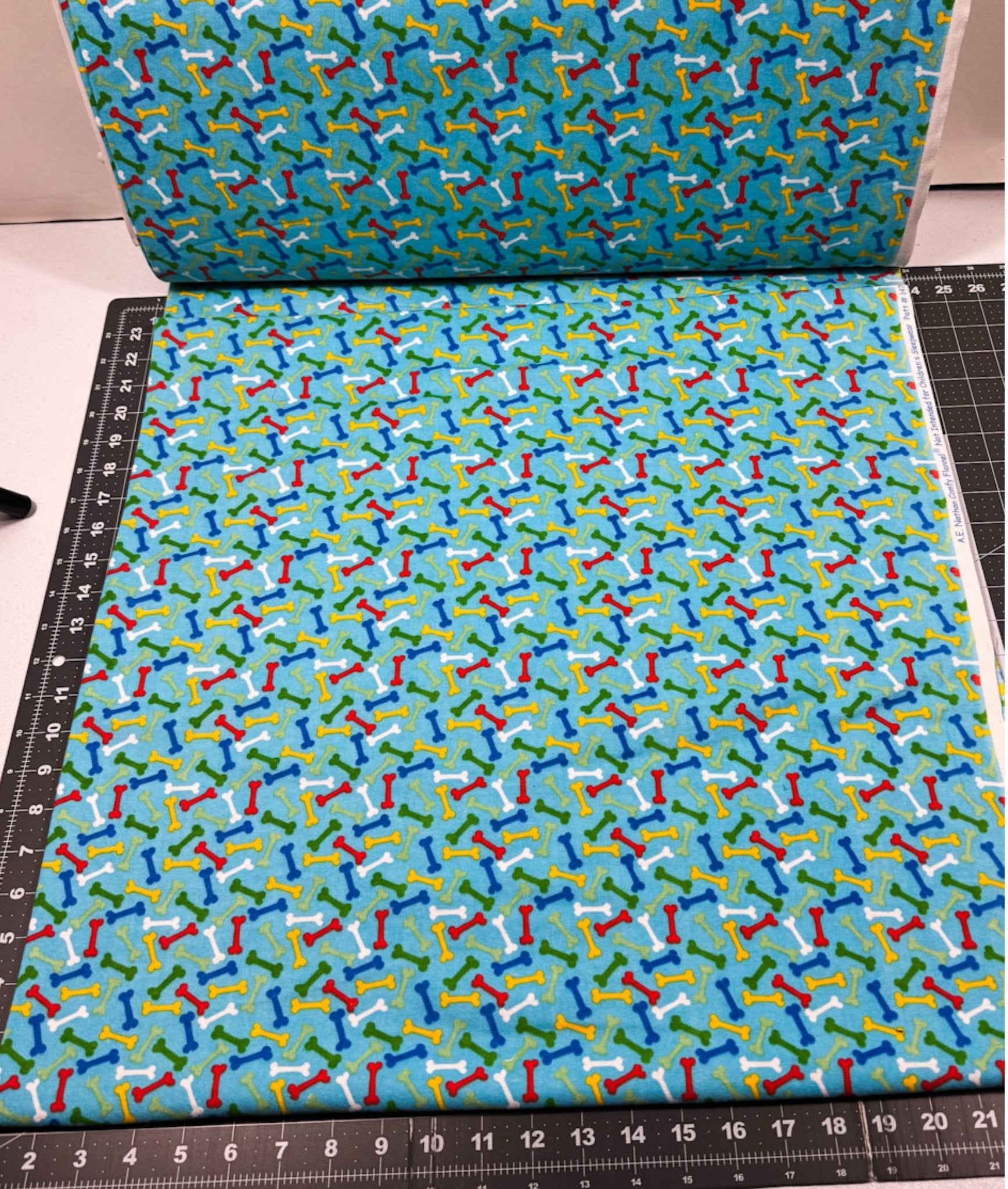 Colorful Dog Bones FLANNEL 14706 Blue Dog Cotton Flannel - Mary Jo Fabrics