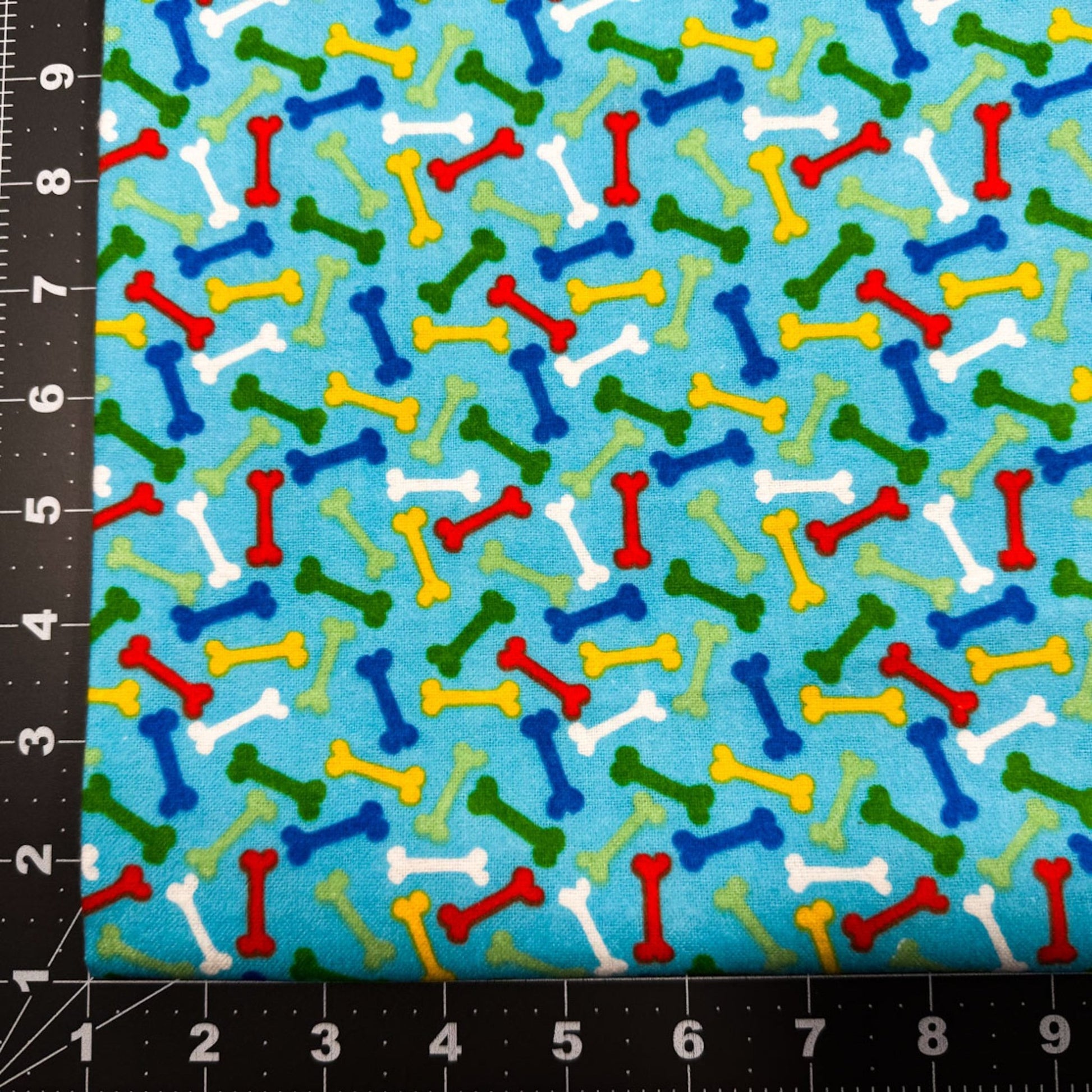 Colorful Dog Bones FLANNEL 14706 Blue Dog Cotton Flannel - Mary Jo Fabrics