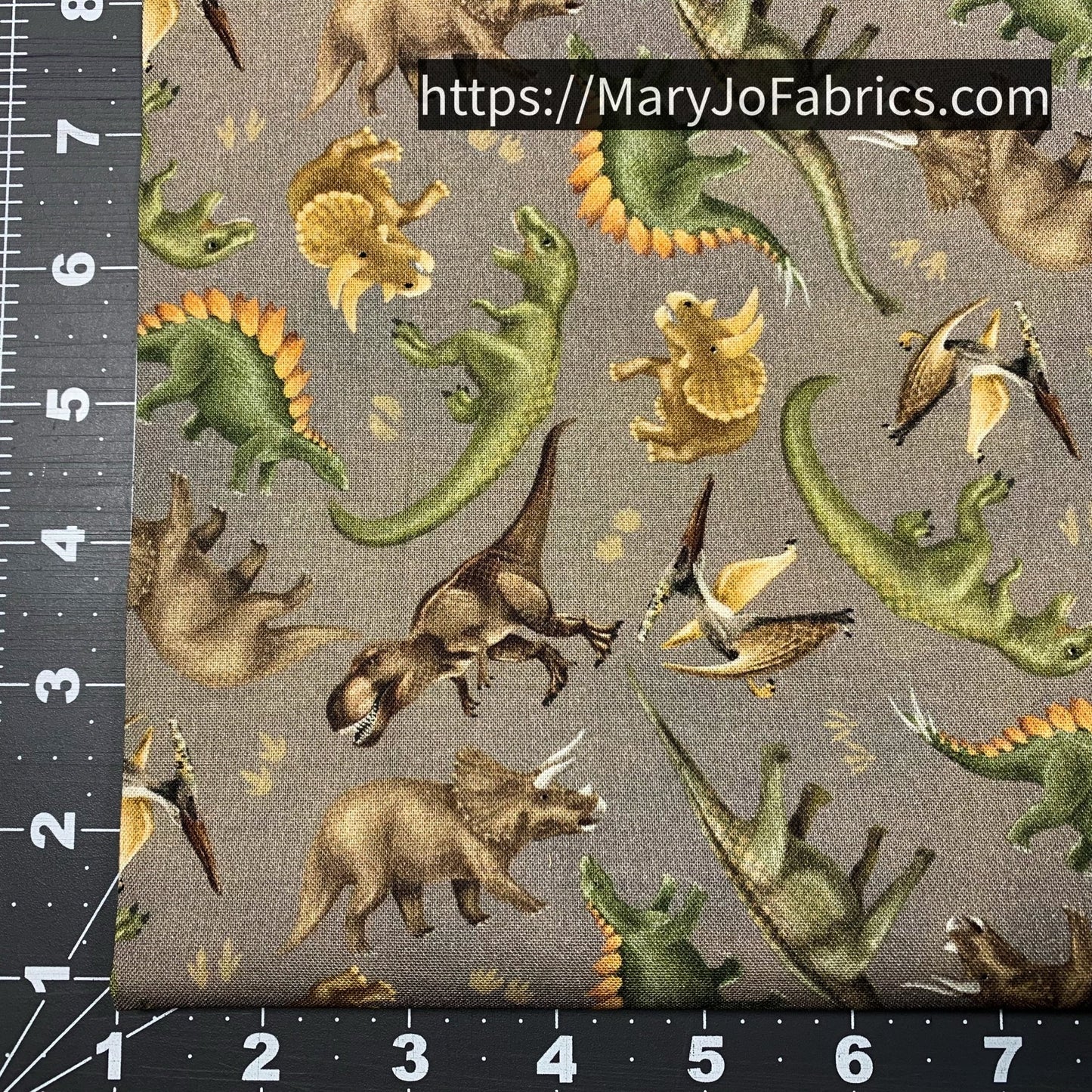 Dinosaur fabric 24152 Taupe Trail of Dinos - Mary Jo Fabrics