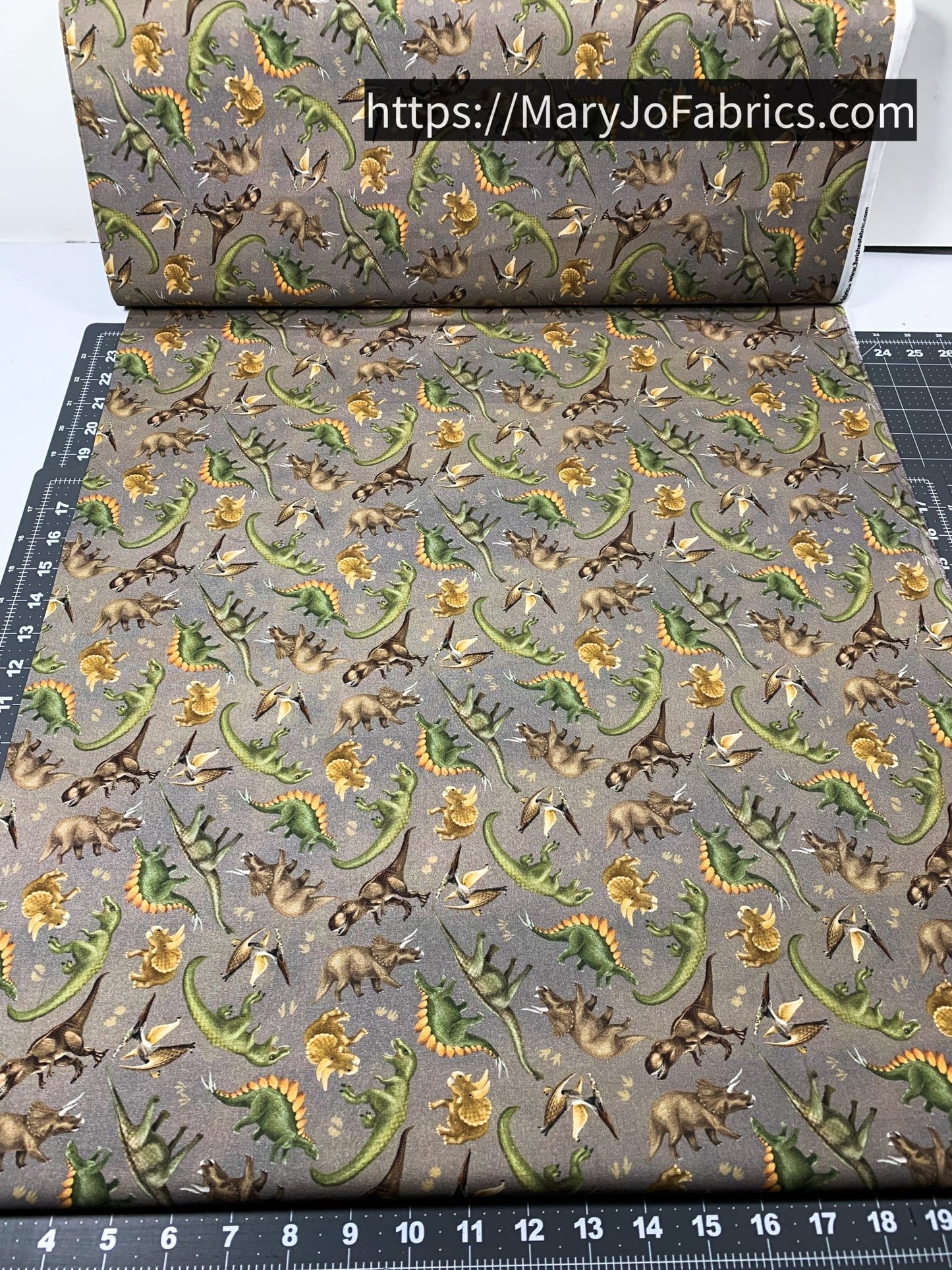 Dinosaur fabric 24152 Taupe Trail of Dinos - Mary Jo Fabrics