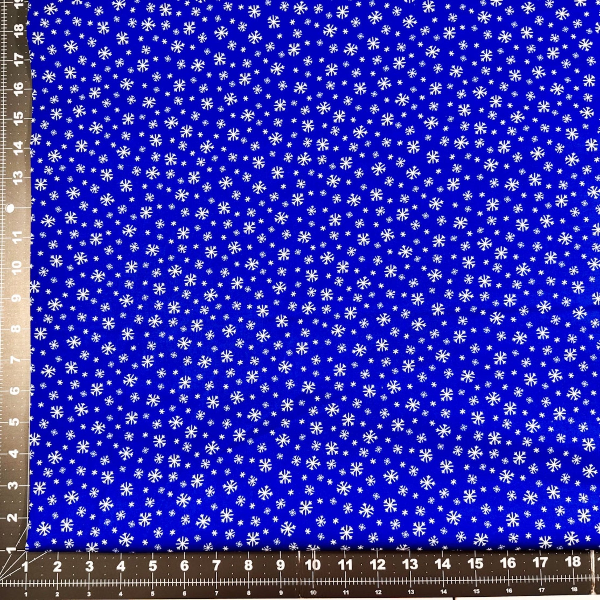 Frosty Flakes White Snowflake fabric Royal Blue Cotton - Mary Jo Fabrics
