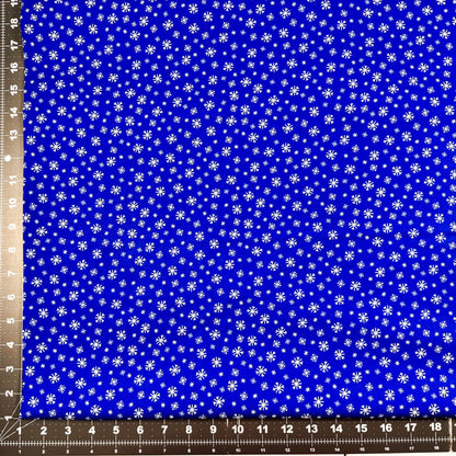 Frosty Flakes White Snowflake fabric Royal Blue Cotton - Mary Jo Fabrics