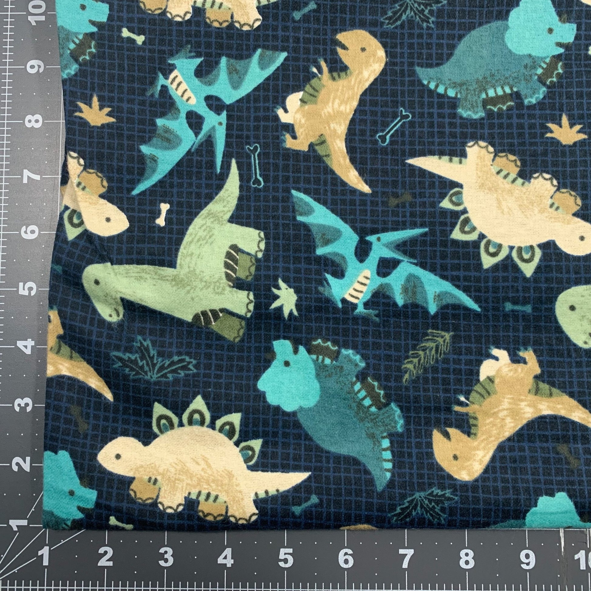 Going Dino Blue Dinosaur FLANNEL Fabric DX2569 dino flannel - Mary Jo Fabrics