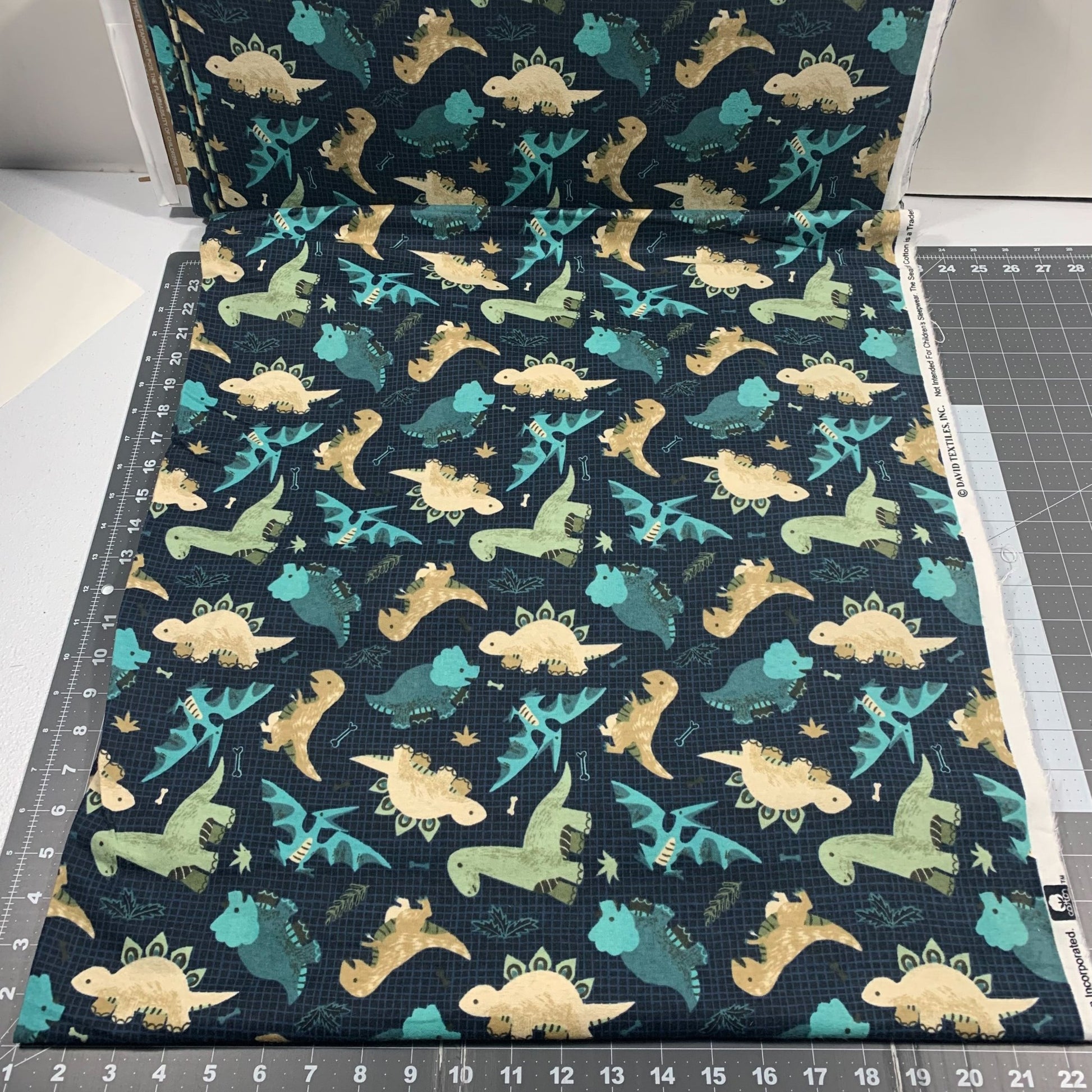 Going Dino Blue Dinosaur FLANNEL Fabric DX2569 dino flannel - Mary Jo Fabrics