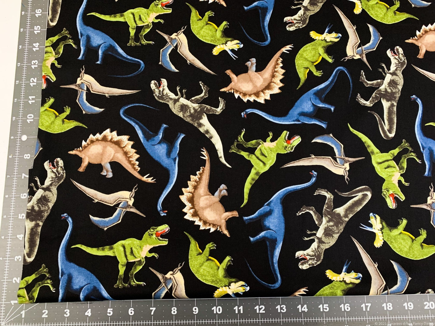 Green dinosaur fabric C5726 dinosaurs cotton - Mary Jo Fabrics