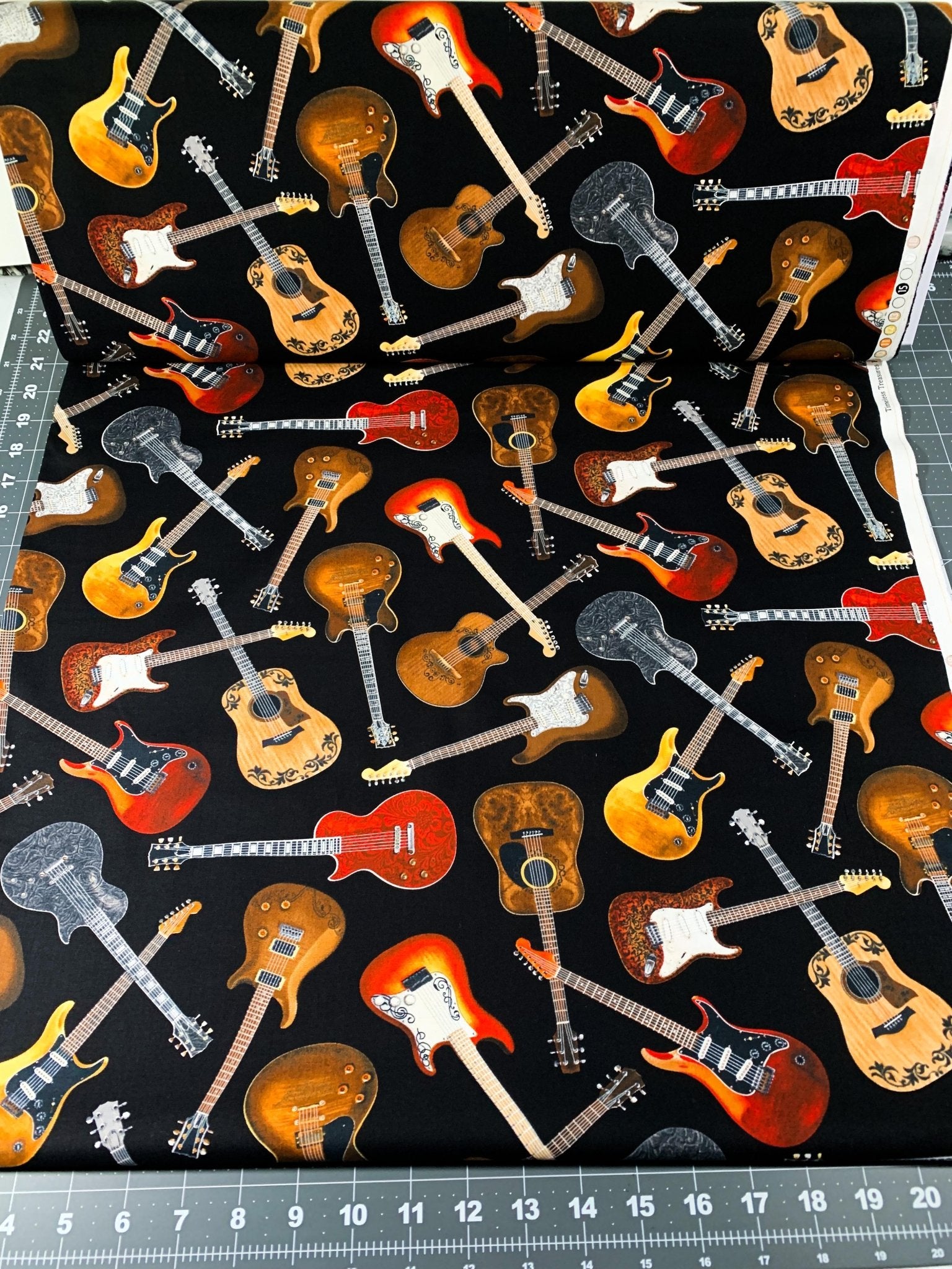 Guitar fabric C1611 Black Tossed Guitars cotton fabric - Mary Jo Fabrics