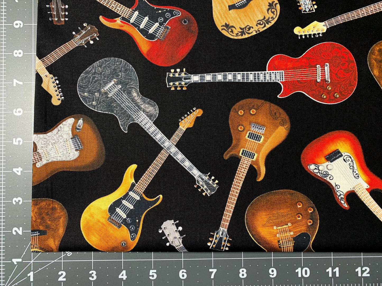 Guitar fabric C1611 Black Tossed Guitars cotton fabric - Mary Jo Fabrics