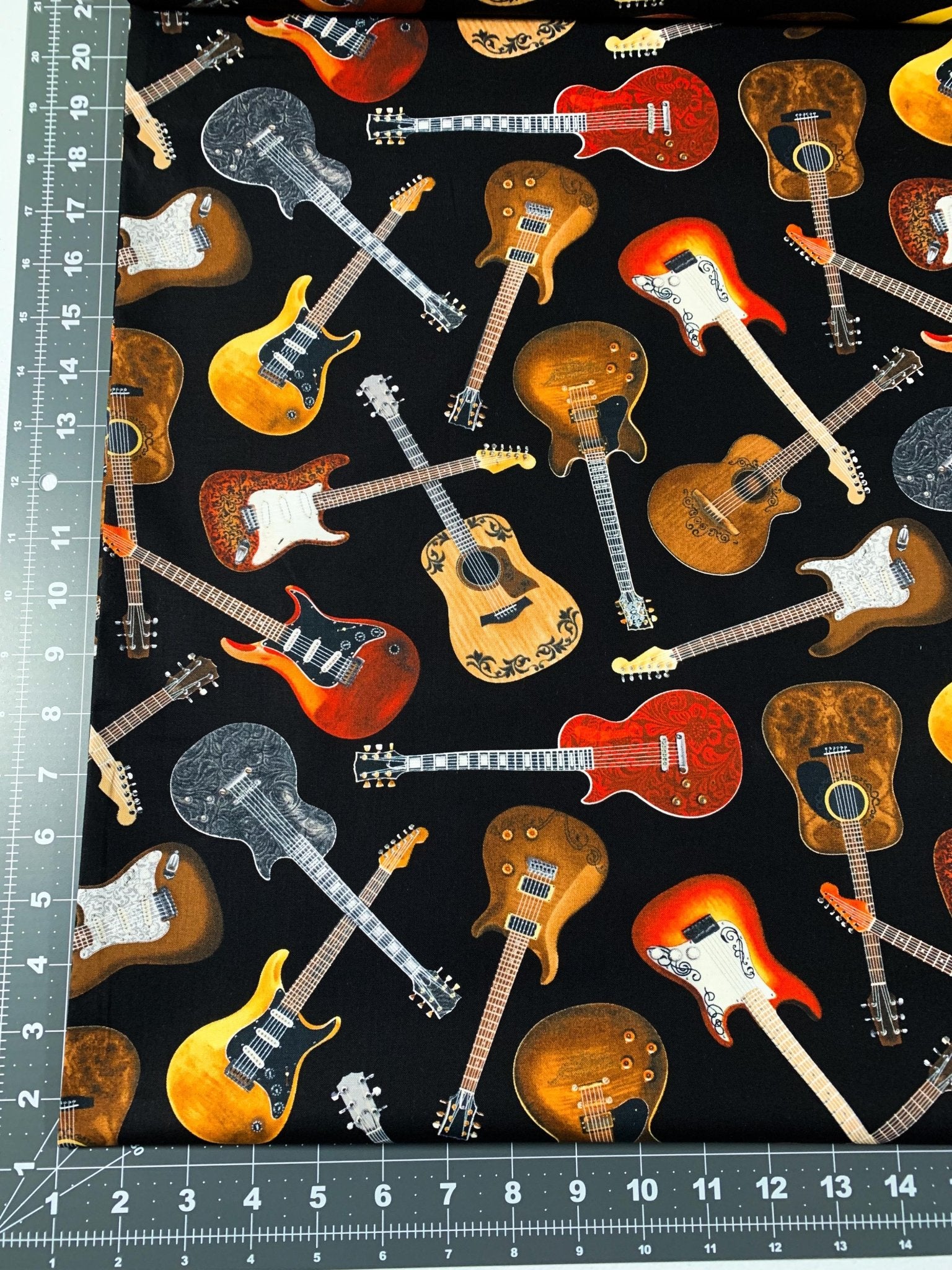 Guitar fabric C1611 Black Tossed Guitars cotton fabric - Mary Jo Fabrics