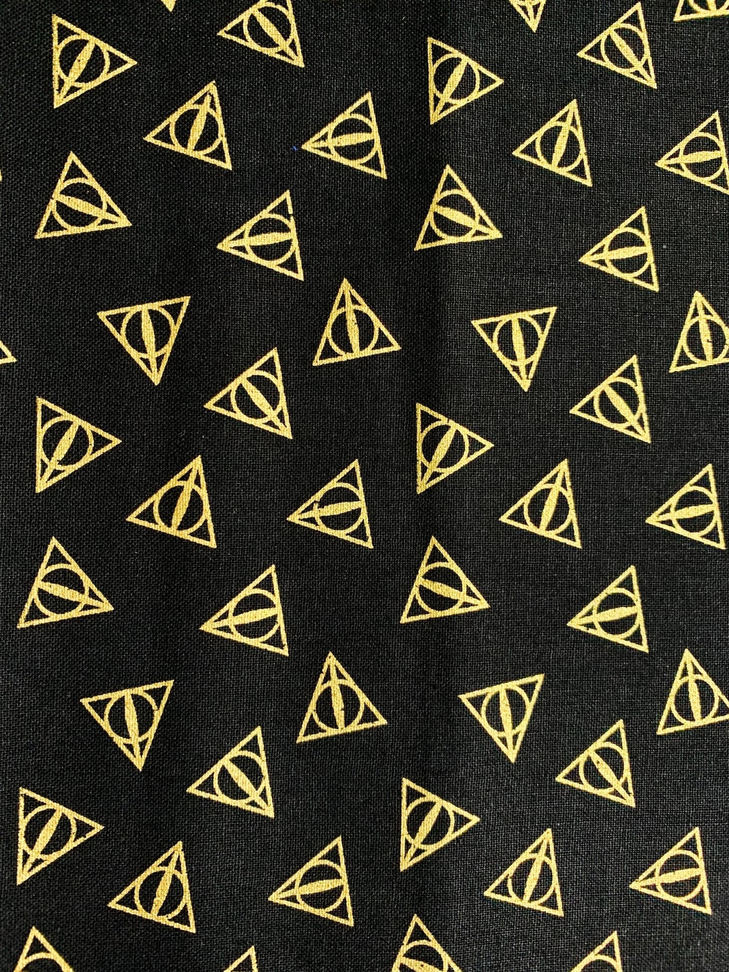 Harry Potter fabric Gold Metallic Deathly Hallows Logo - Mary Jo Fabrics