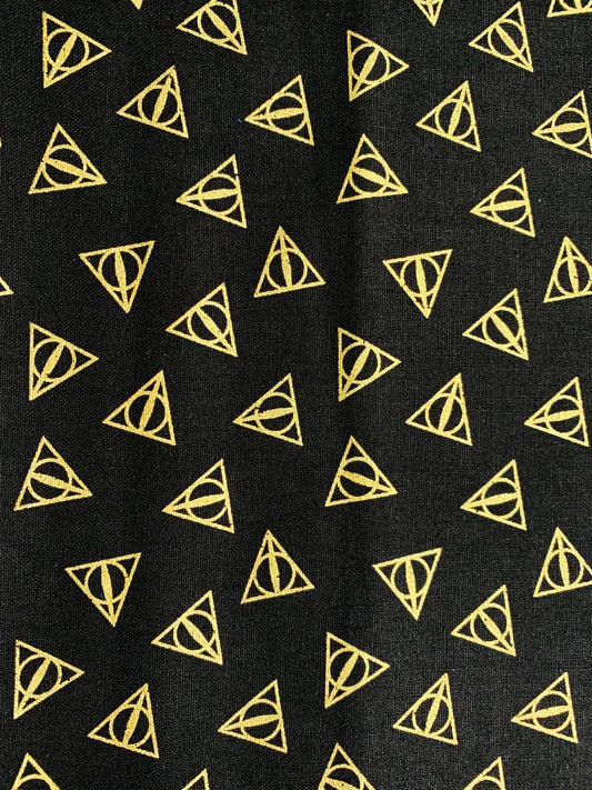 Harry Potter fabric Gold Metallic Deathly Hallows Logo - Mary Jo Fabrics