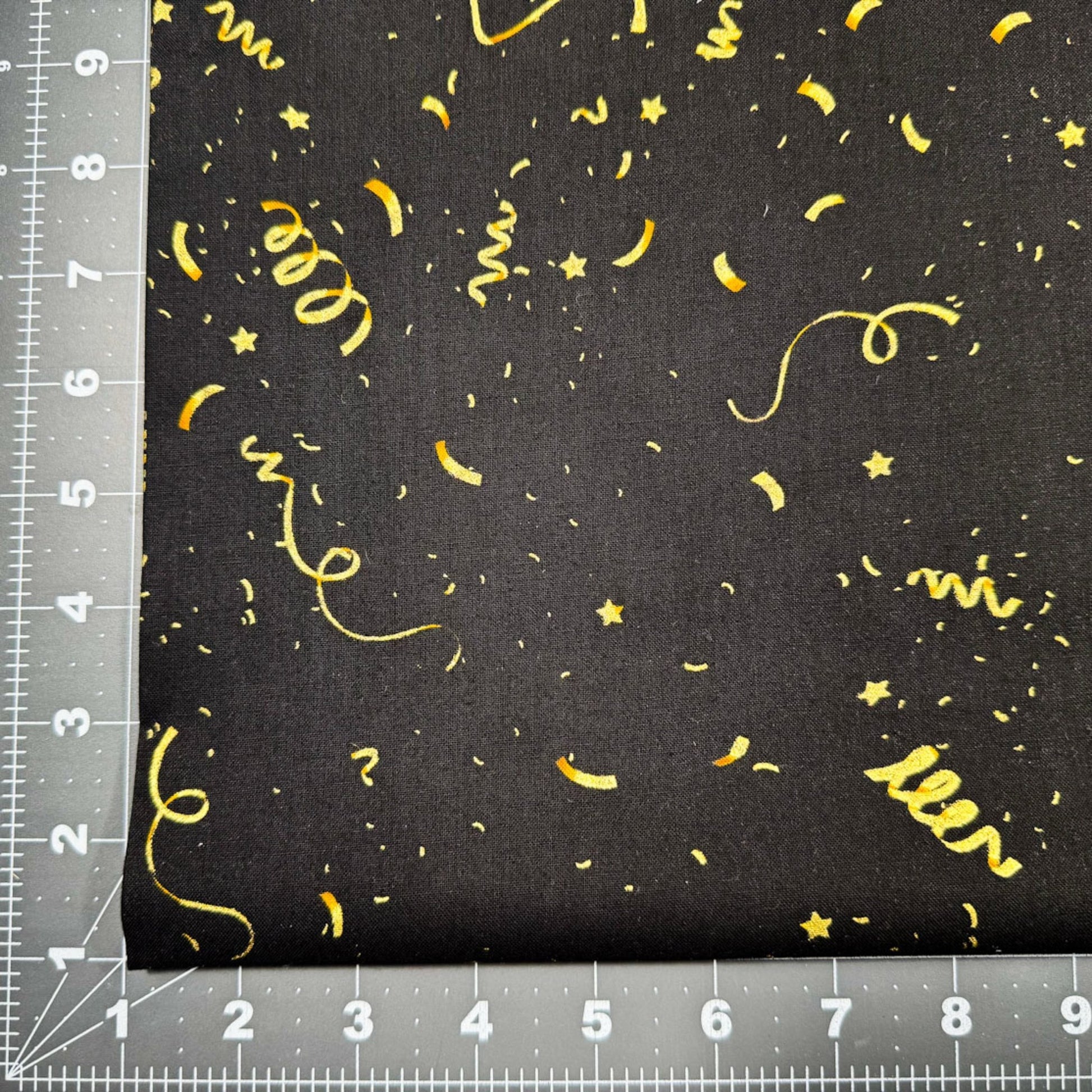 Black Party Streamer Fabric CM2900 Gold Metallic - Mary Jo Fabrics