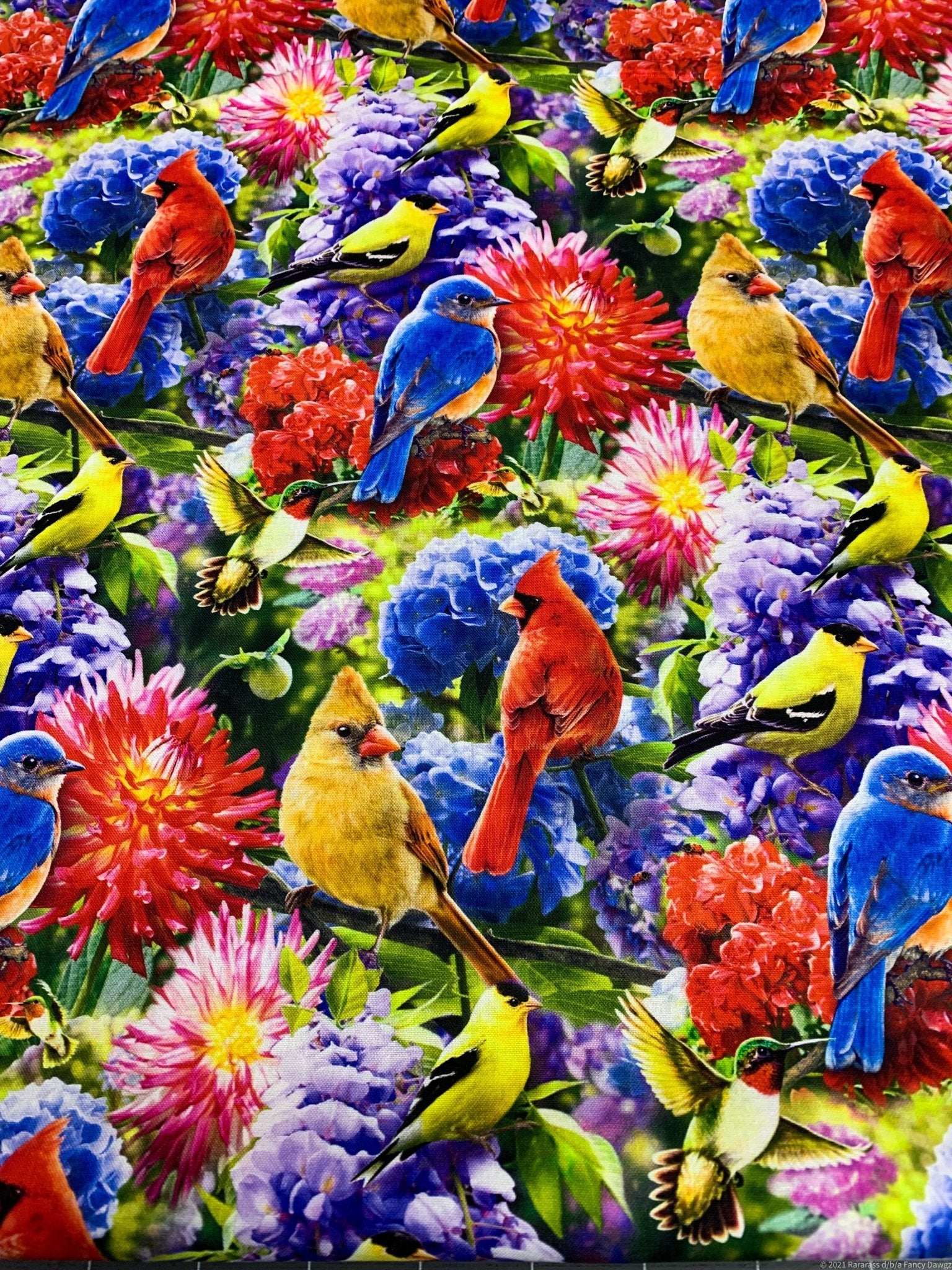 Hummingbird and Red Cardinal fabric in the flower garden - Mary Jo Fabrics