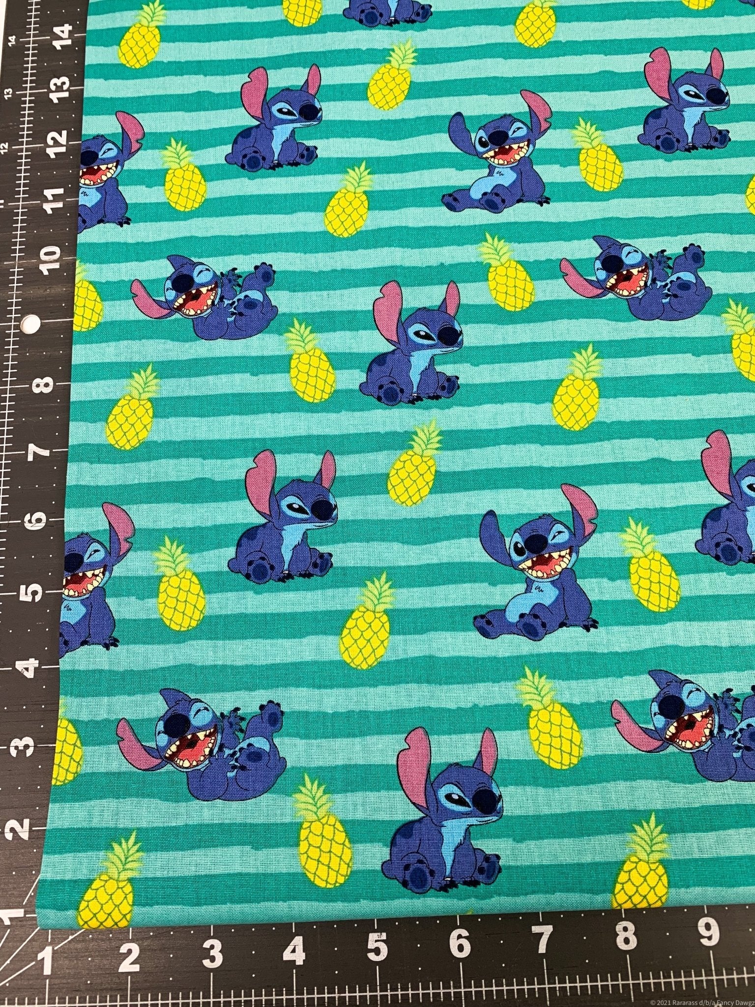 Lilo and Stitch fabric CP69547 Green stripe - Mary Jo Fabrics