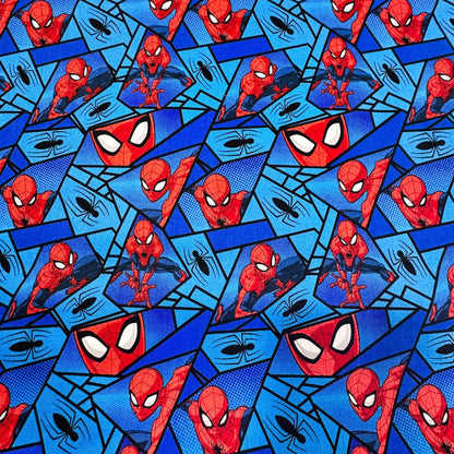 Marvel Spiderman Fabric on Blue with Black Spiders - Mary Jo Fabrics