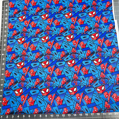 Marvel Spiderman Fabric on Blue with Black Spiders - Mary Jo Fabrics