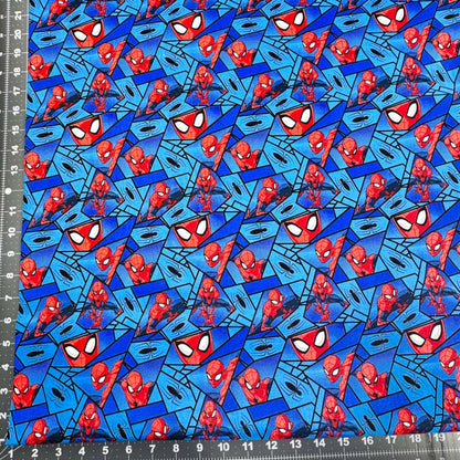 Marvel Spiderman Fabric on Blue with Black Spiders - Mary Jo Fabrics