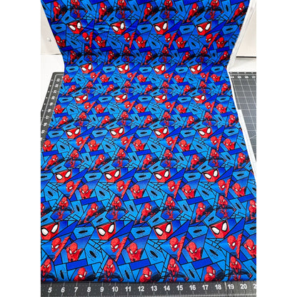 Marvel Spiderman Fabric on Blue with Black Spiders - Mary Jo Fabrics