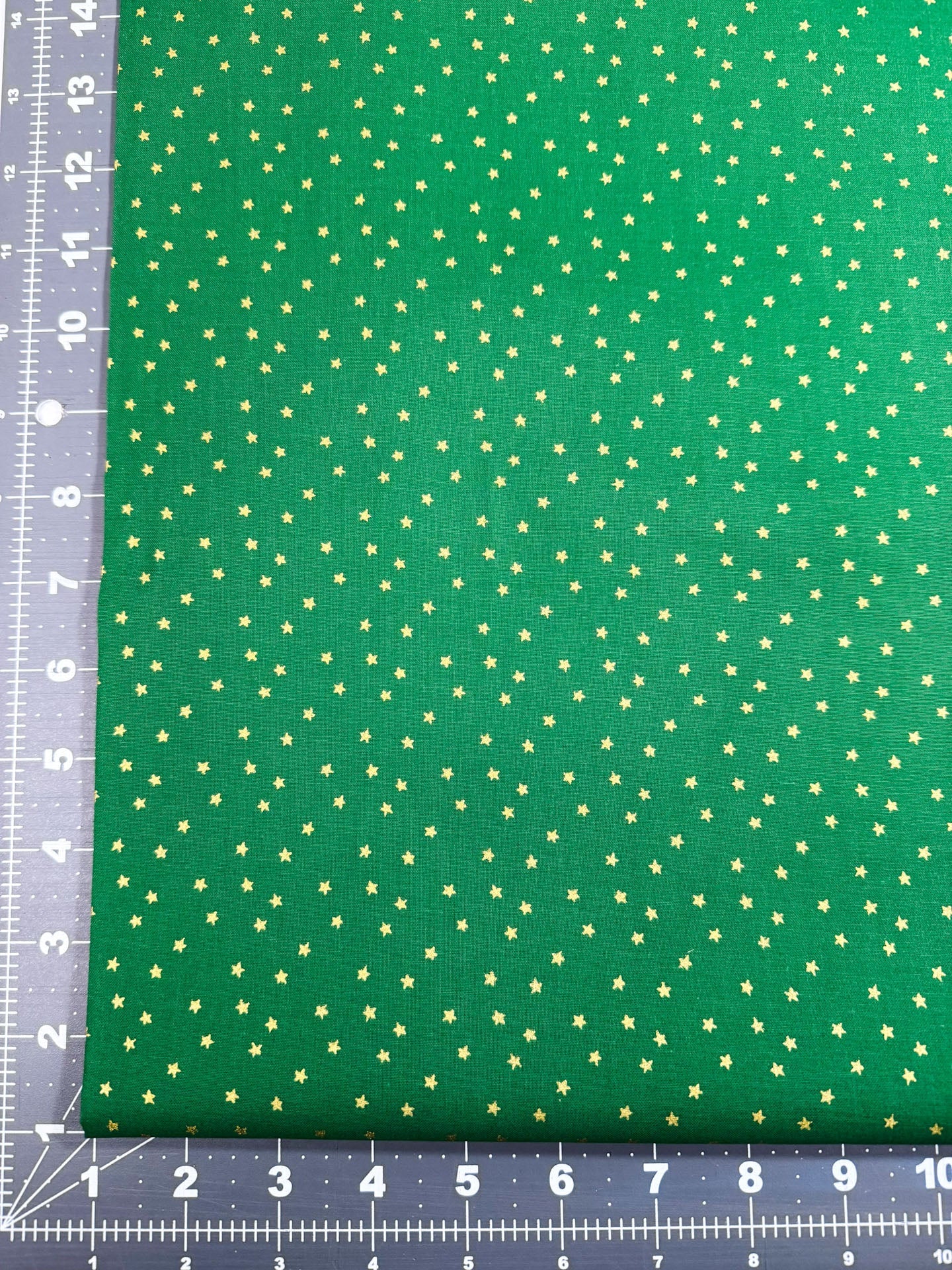 Mini Metallic Gold Star on Green fabric - Mary Jo Fabrics