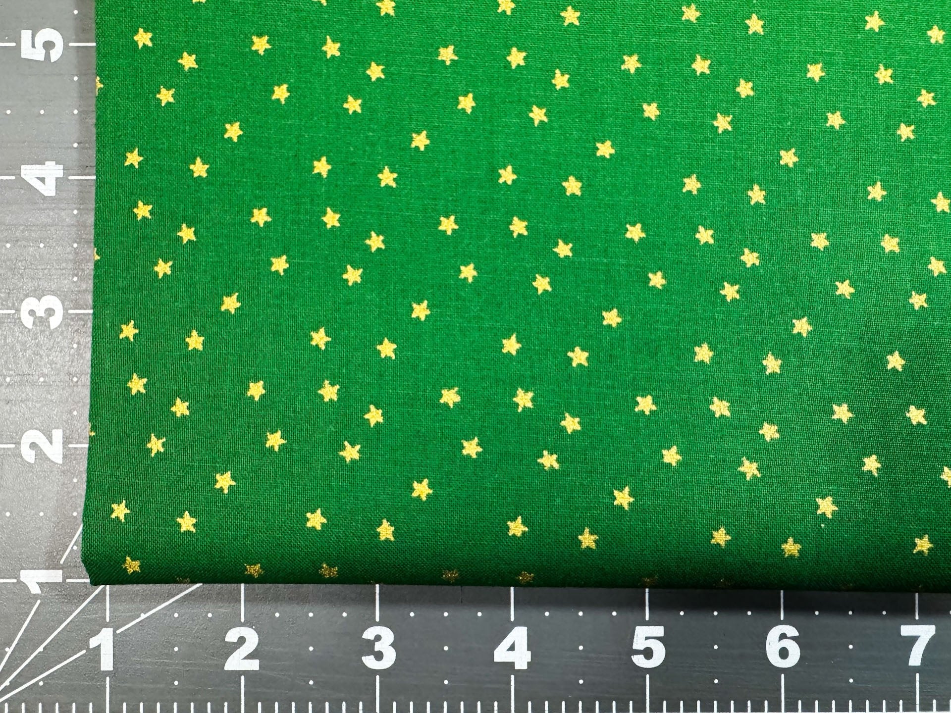 Mini Metallic Gold Star on Green fabric - Mary Jo Fabrics