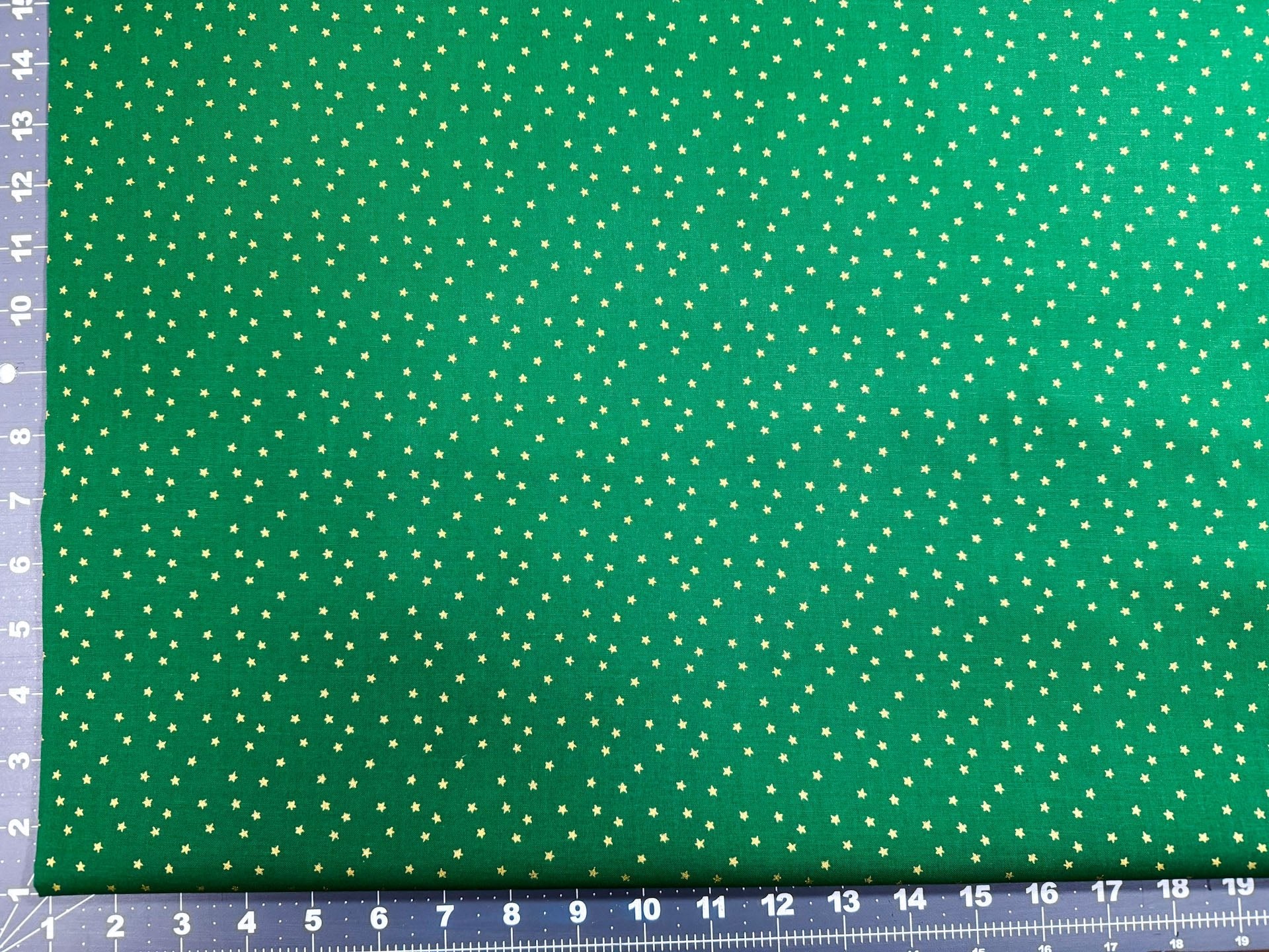 Mini Metallic Gold Star on Green fabric - Mary Jo Fabrics