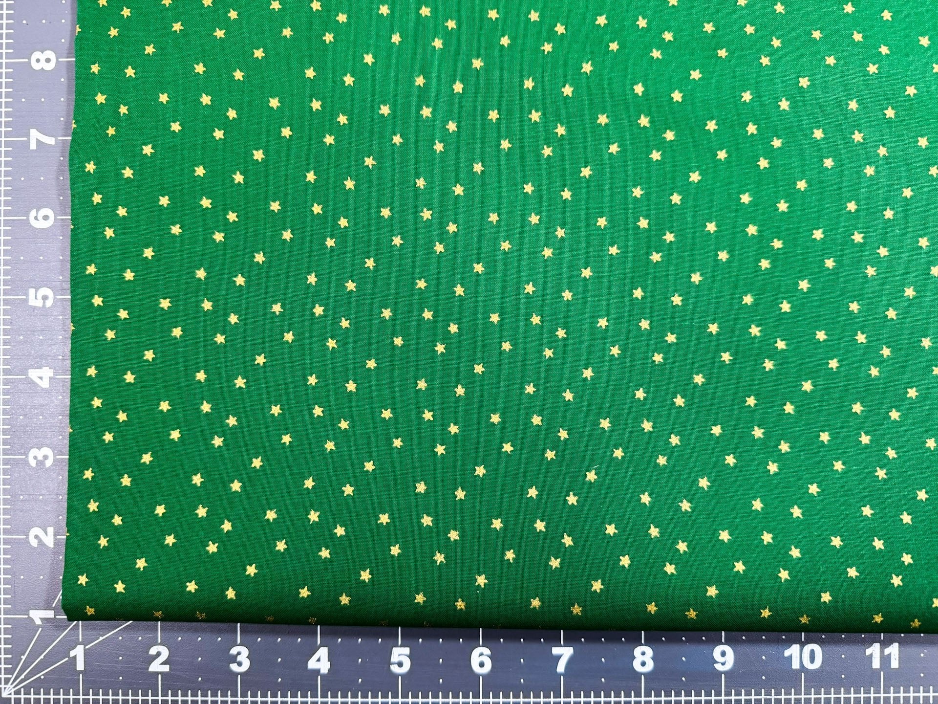 Mini Metallic Gold Star on Green fabric - Mary Jo Fabrics