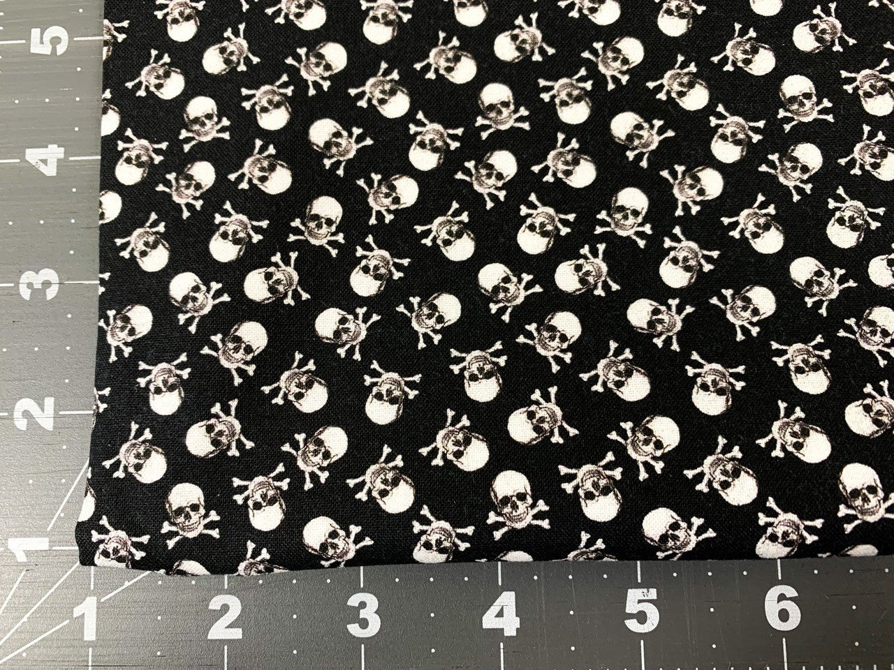 Mini Skulls and Bones fabric CD8902 Jolly Roger Skull fabric - Mary Jo Fabrics