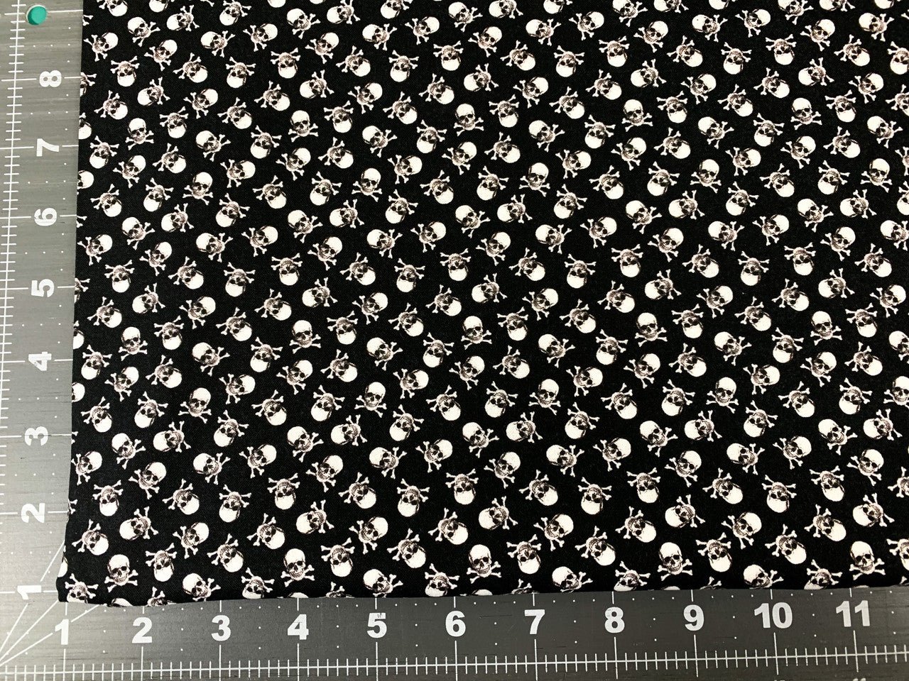 Mini Skulls and Bones fabric CD8902 Jolly Roger Skull fabric - Mary Jo Fabrics