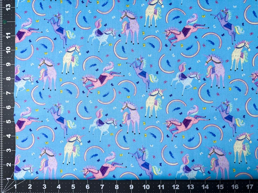 Moonbeams and Rainbows Unicorn fabric on Blue - Mary Jo Fabrics