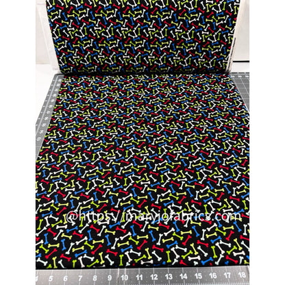 Multi Color Dog Bone FLANNEL Fabric 14706 Bones on Black - Mary Jo Fabrics