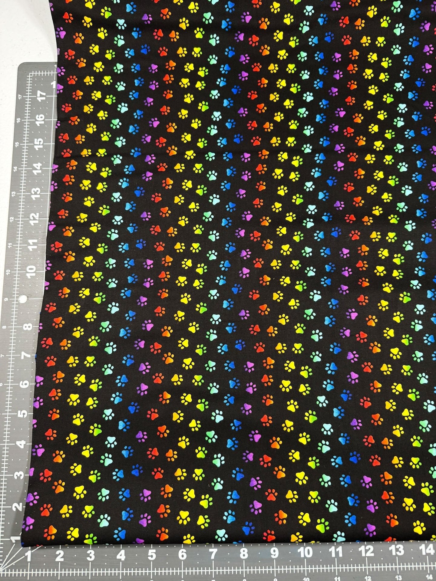 Neon Cat Paw fabric Allover animal paws - Mary Jo Fabrics