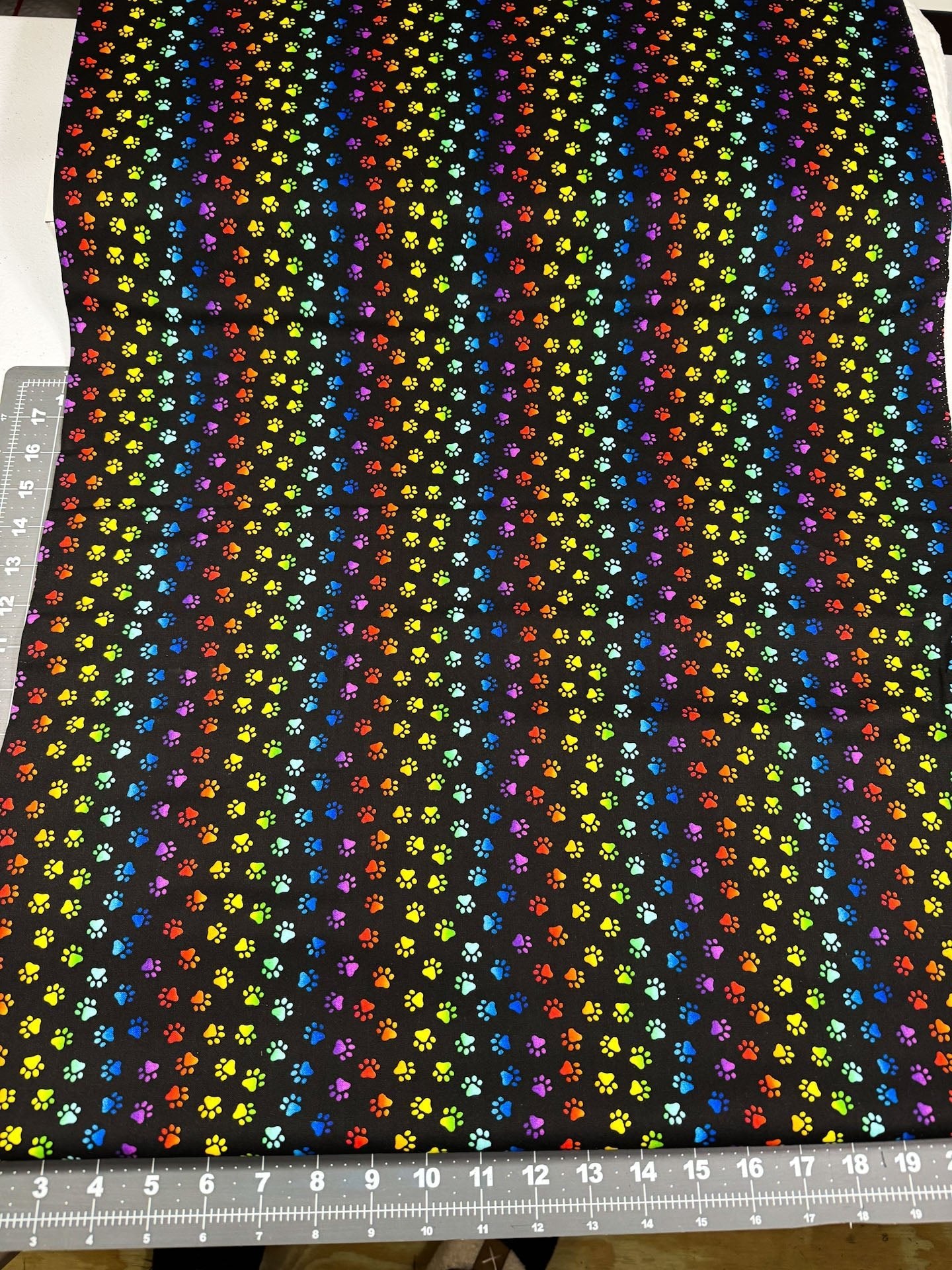 Neon Cat Paw fabric Allover animal paws - Mary Jo Fabrics