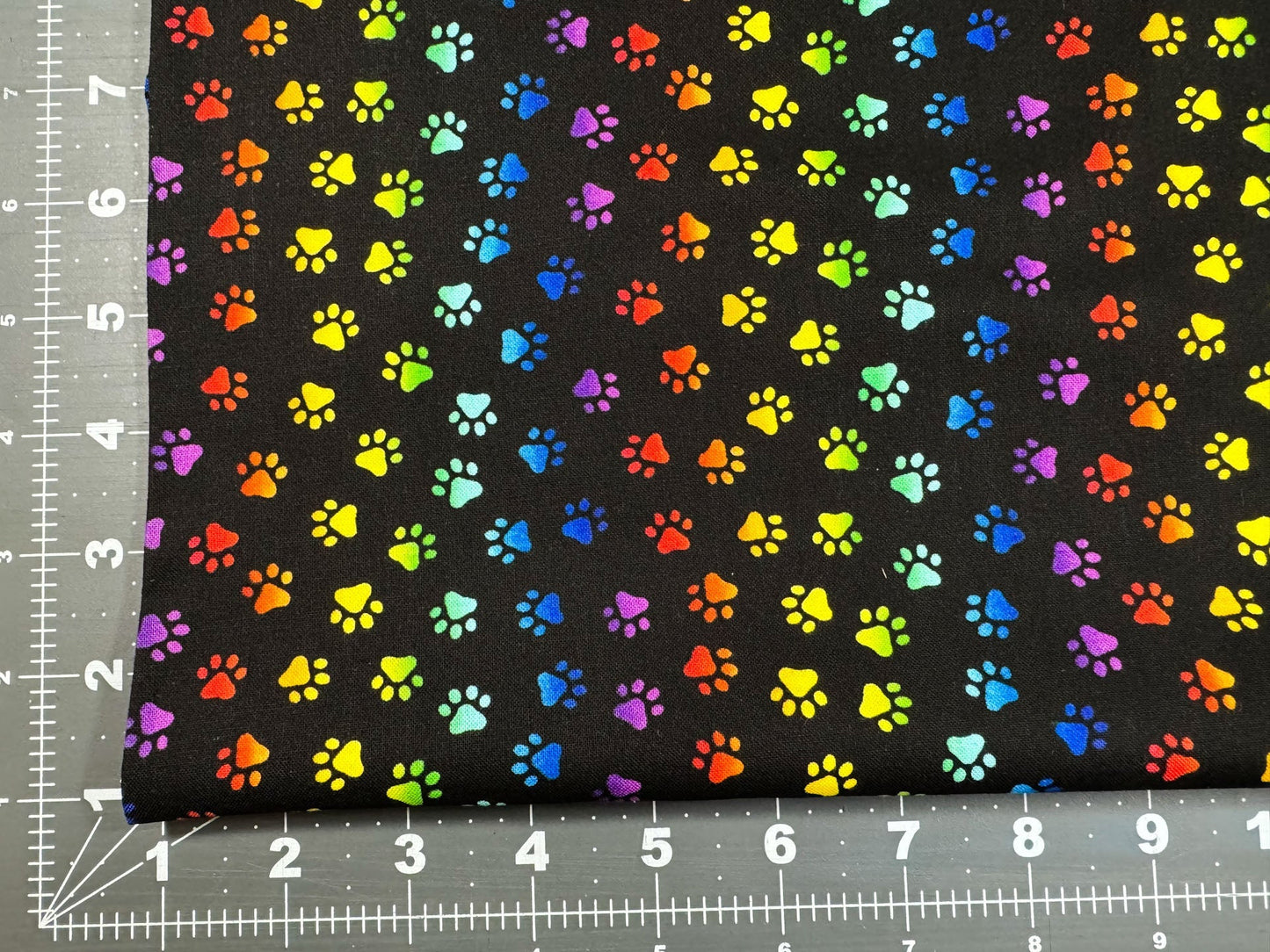 Neon Cat Paw fabric Allover animal paws - Mary Jo Fabrics