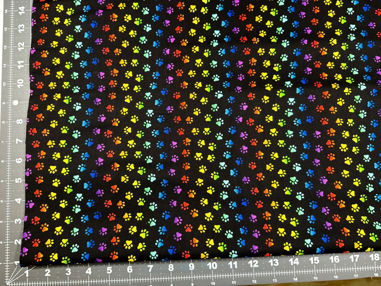 Neon Cat Paw fabric Allover animal paws - Mary Jo Fabrics