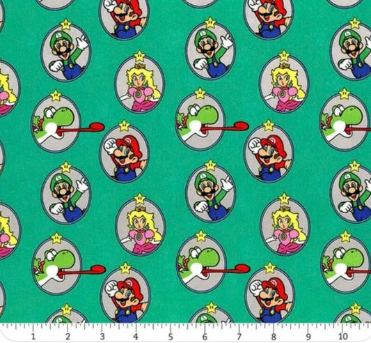 Nintendo Super Mario fabric Green Badges Yoshi - Mary Jo Fabrics