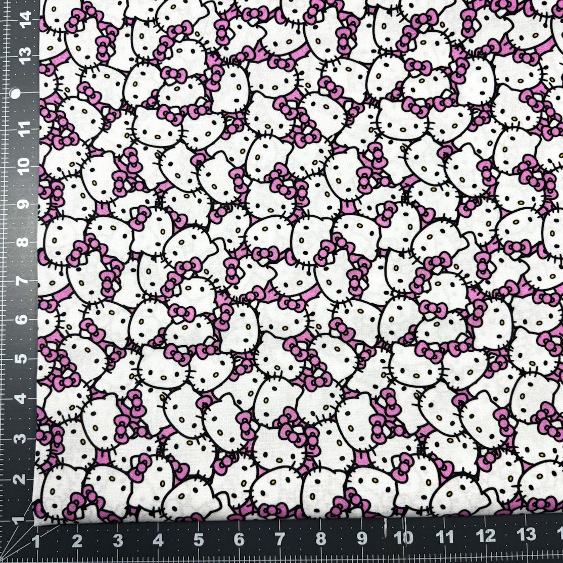 Packed Pink Hello Kitty Fabric CP79663 Pink Bow - Mary Jo Fabrics