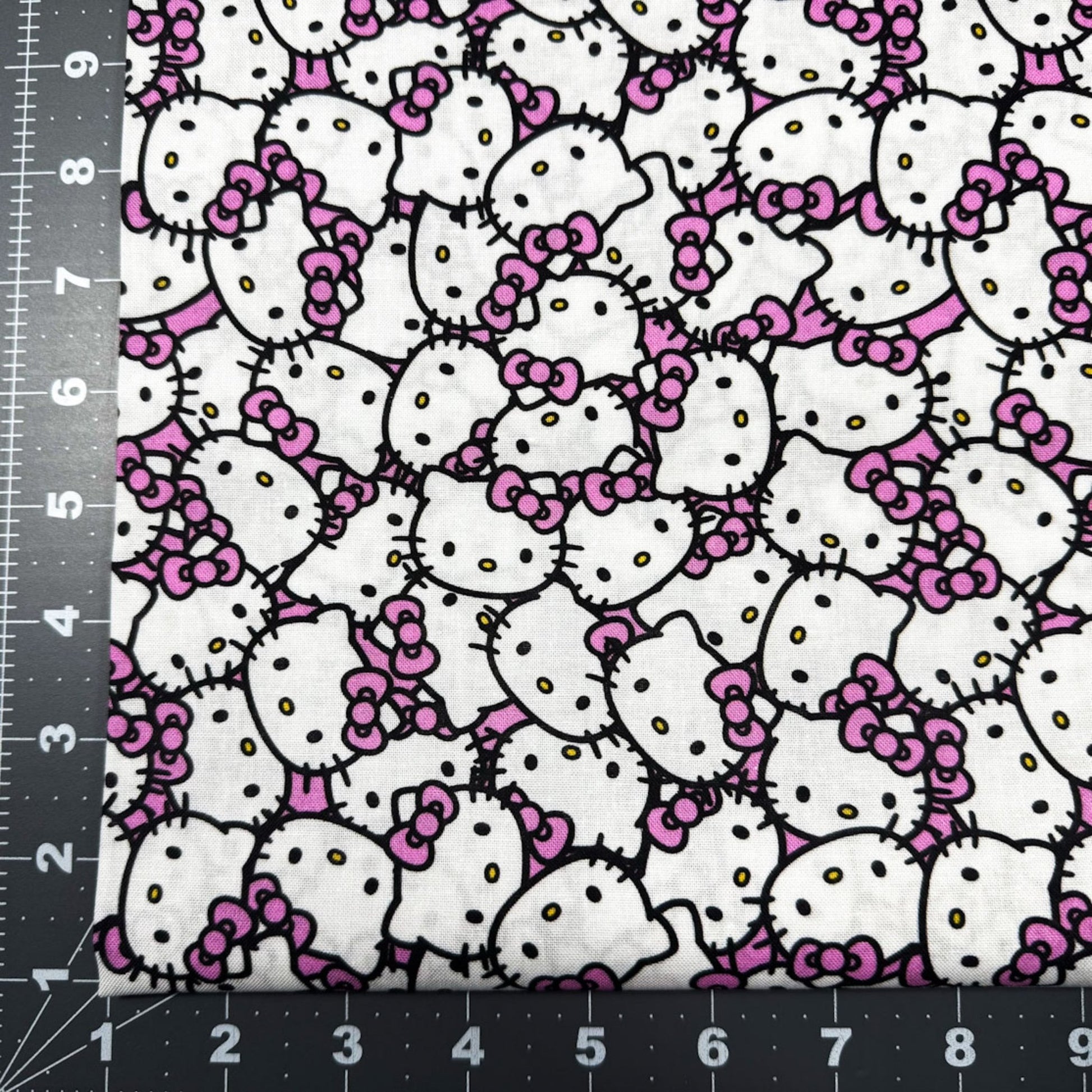 Packed Pink Hello Kitty Fabric CP79663 Pink Bow - Mary Jo Fabrics