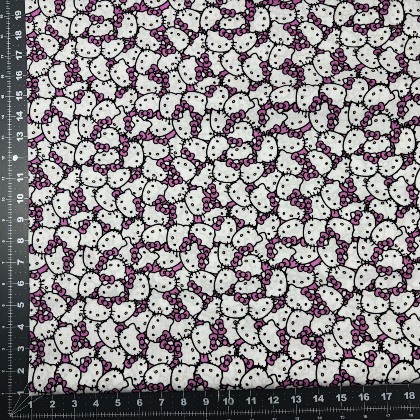 Packed Pink Hello Kitty Fabric CP79663 Pink Bow - Mary Jo Fabrics