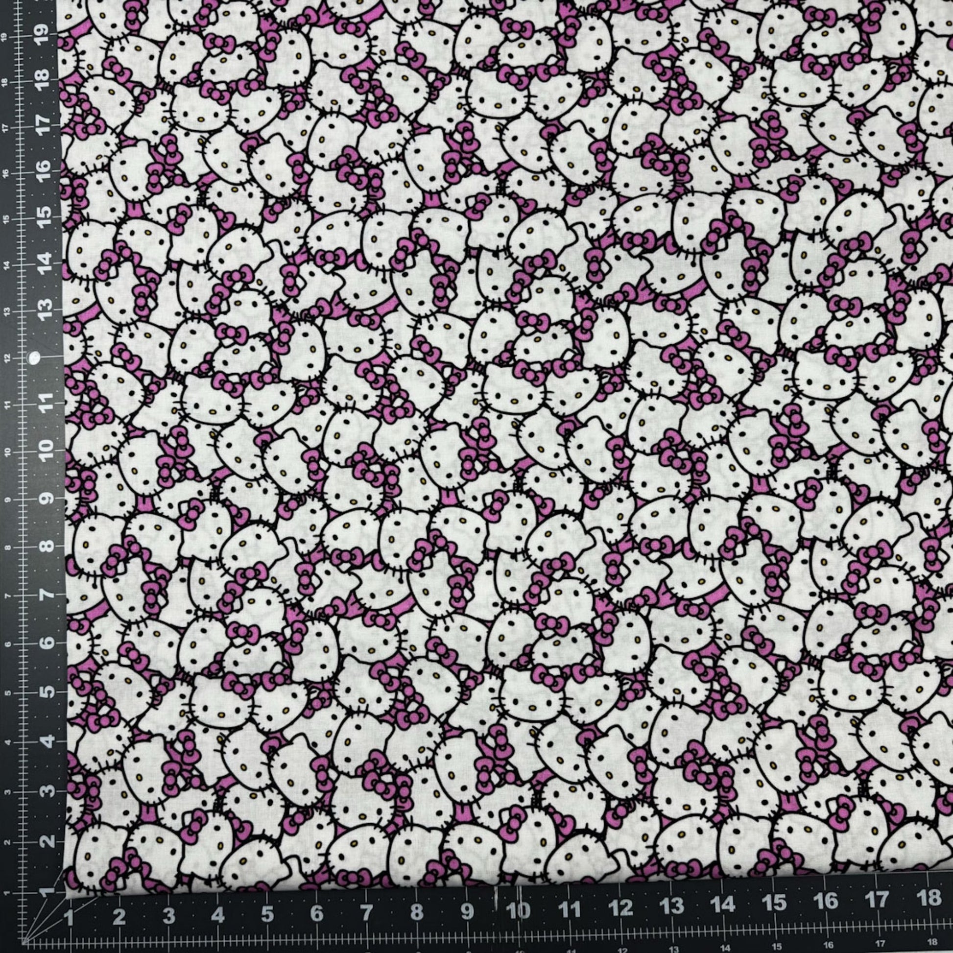 Packed Pink Hello Kitty Fabric CP79663 Pink Bow - Mary Jo Fabrics